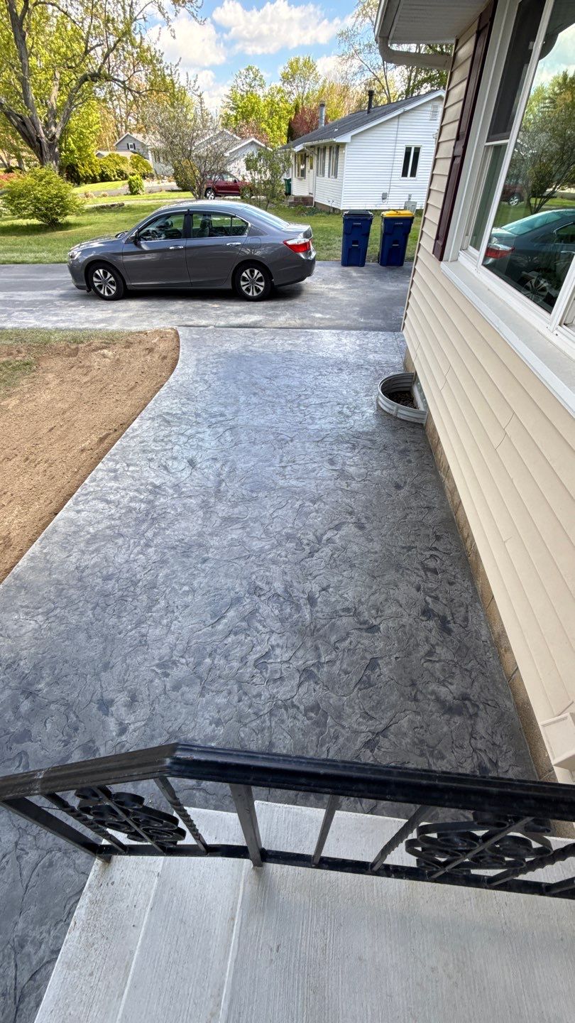 Oxford slate textured patio and step  by NG Masonry & Construction LLC