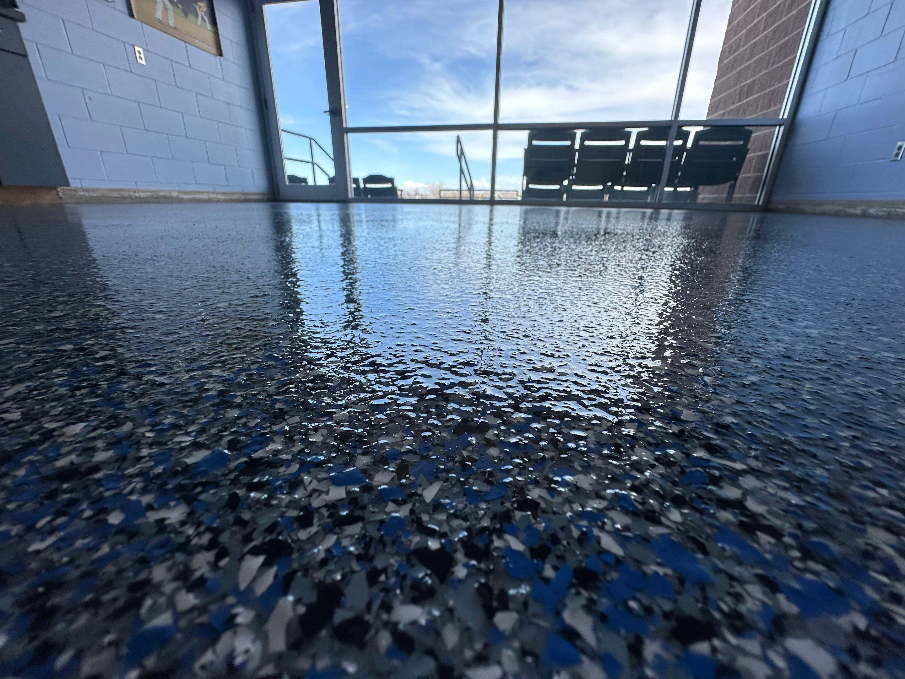 Commercial Epoxy Floor Coating for Stadium Viewing Suites in Sioux Falls by Select Painting, Coatings & Garage Cabinets