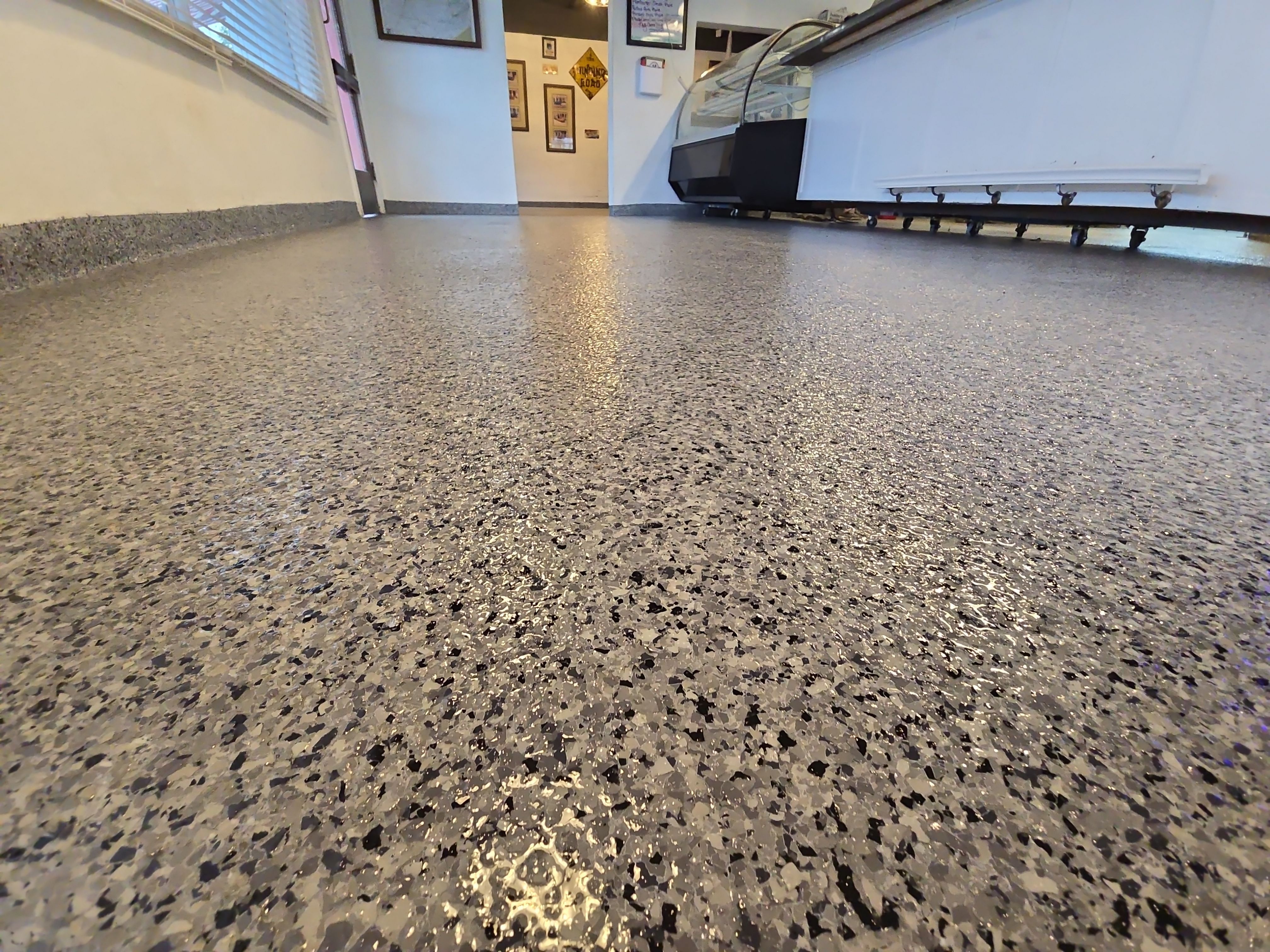 Check it out! Steelwheel Corner gets a new floor! by Elite Floor Solutions
