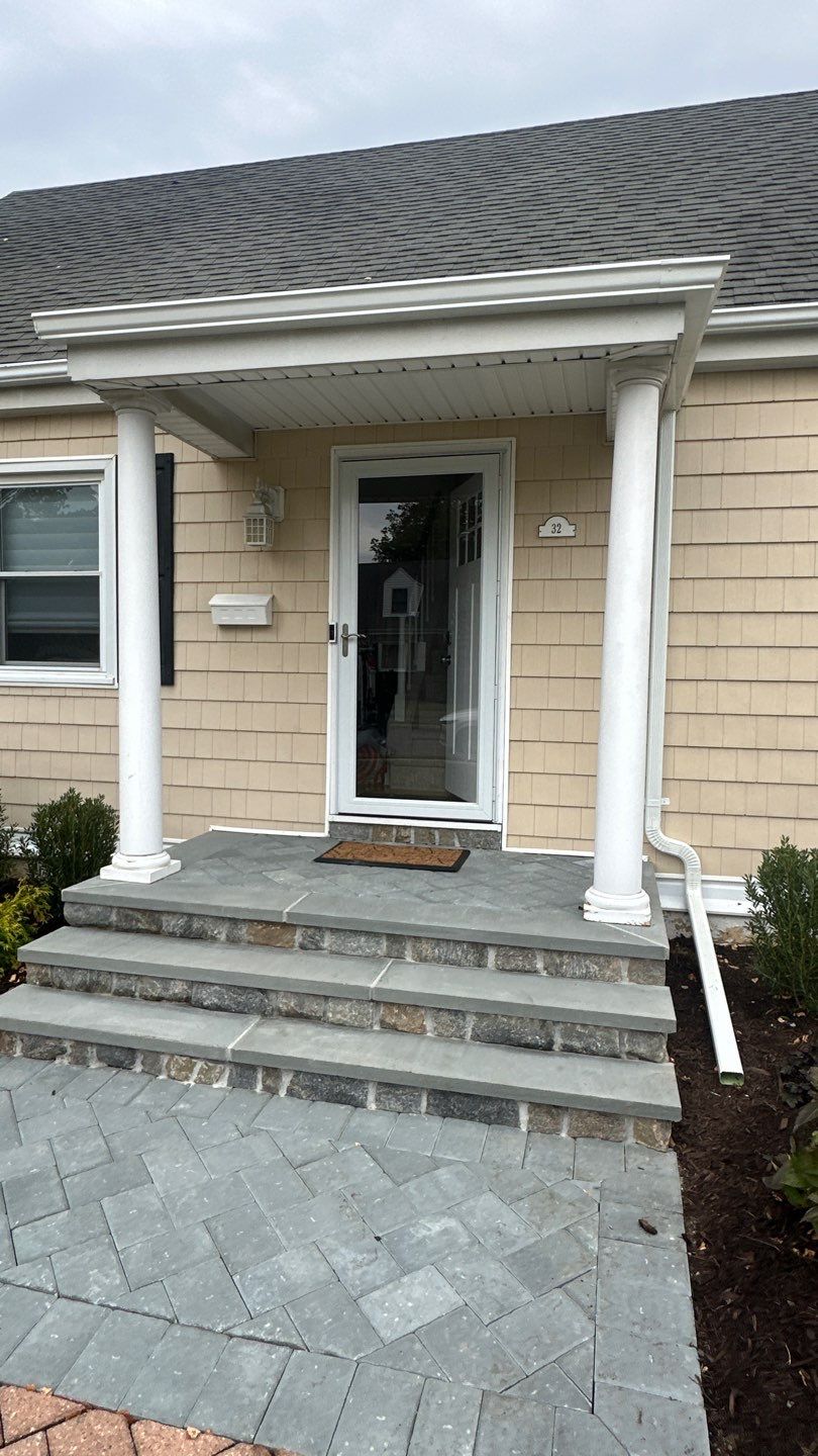 Gutter Installation using 5"white K style seamless gutters and 2x3 white leaders by Above All Gutters 