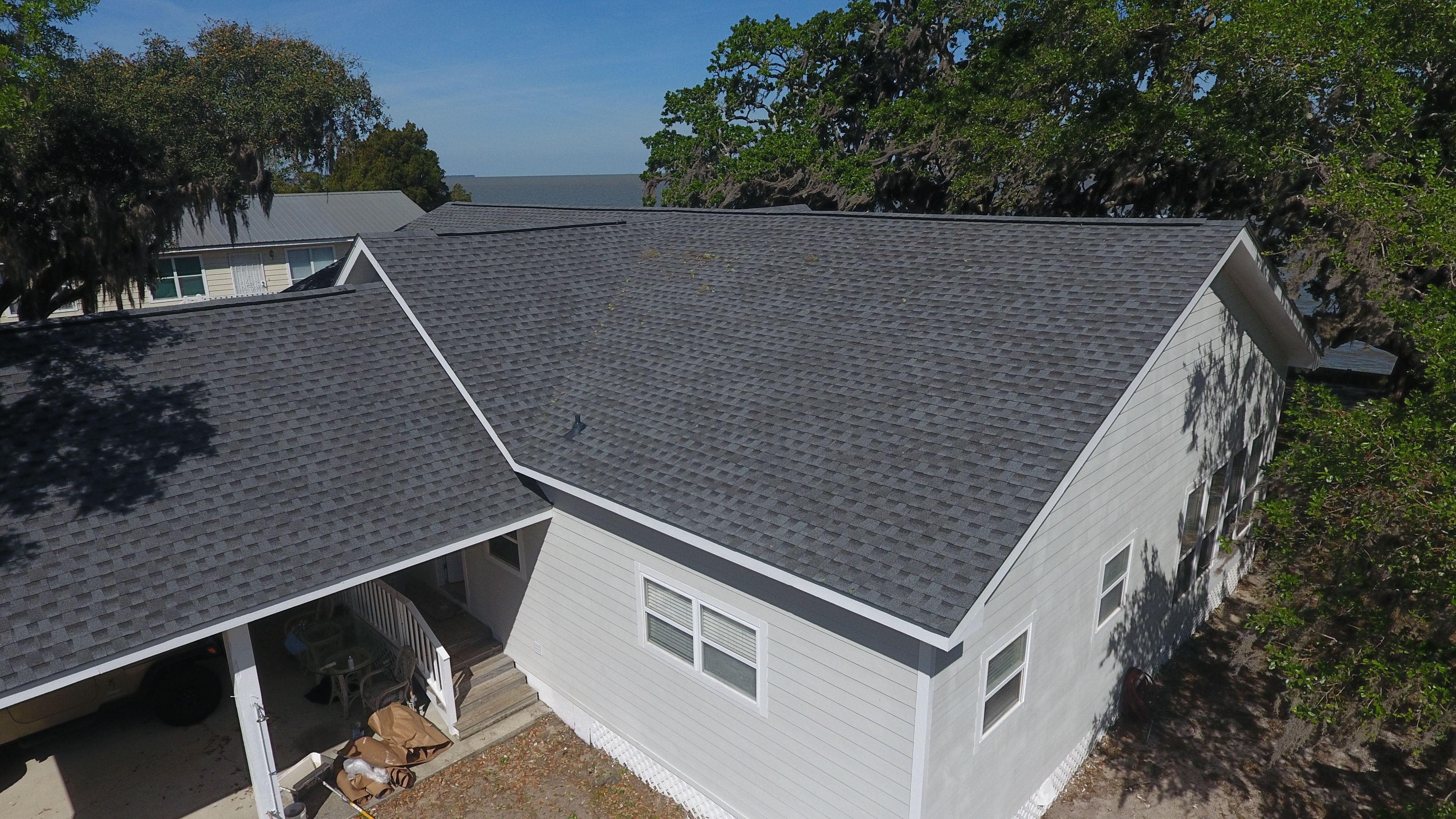 Residential Roofing Installation using Roof Replacement by American Roofing & Construction LLC