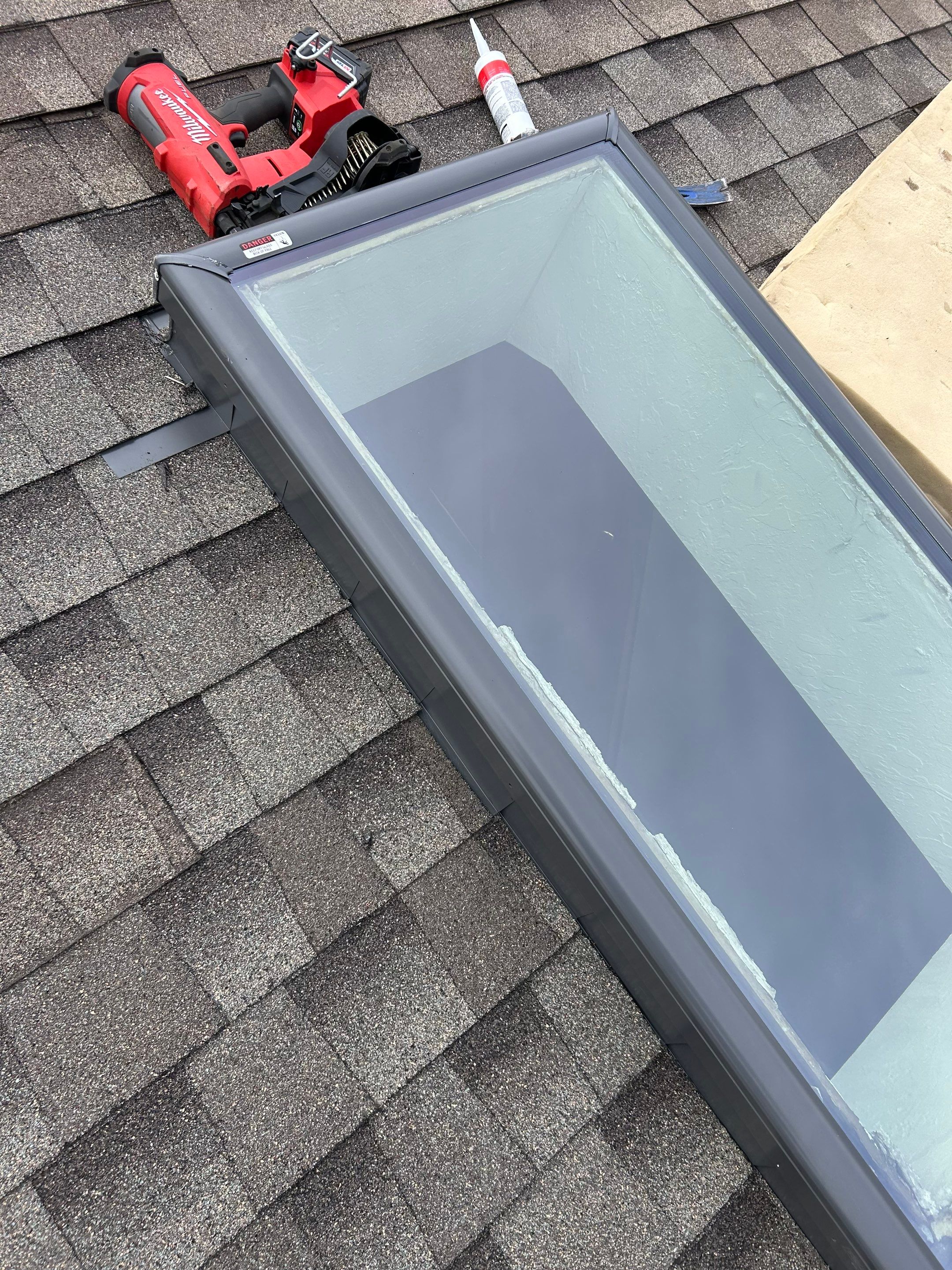 Roof Replacement & Skylight Project in Edmond, OK by McCann's Roofing and Construction
