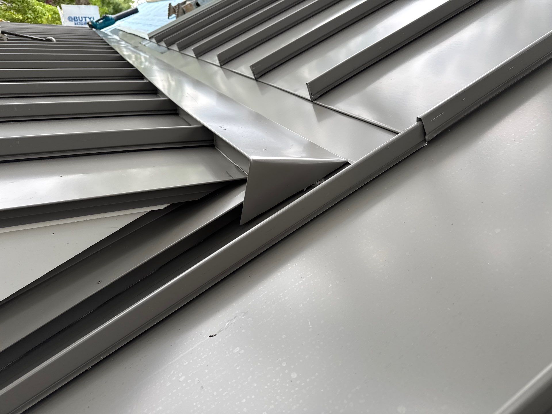 Custom New Construction Metal Roof Installation in Deltaville by Cade Construction