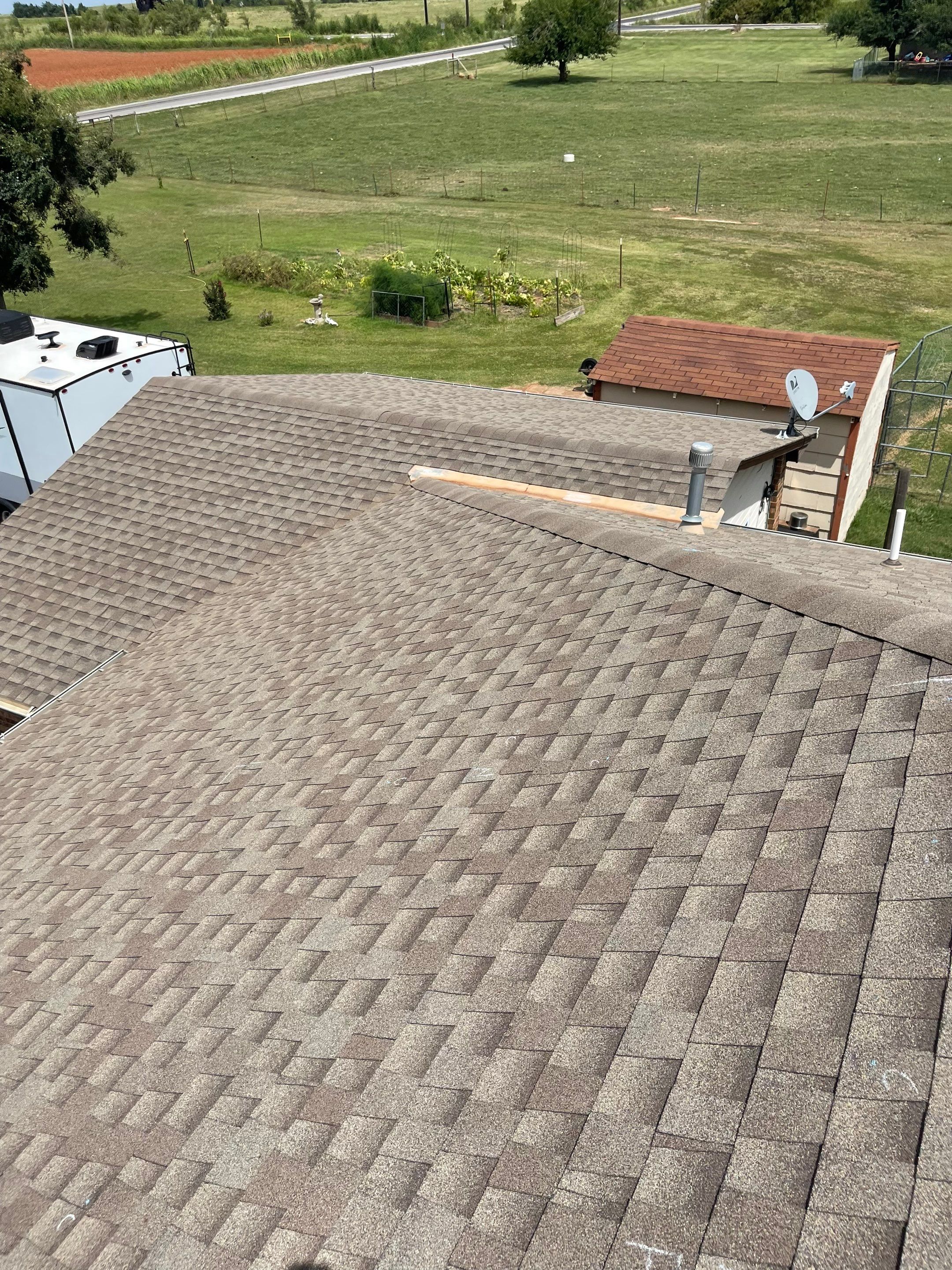 Hail Damage on a Roofing System by Icon Roofing And Construction 
