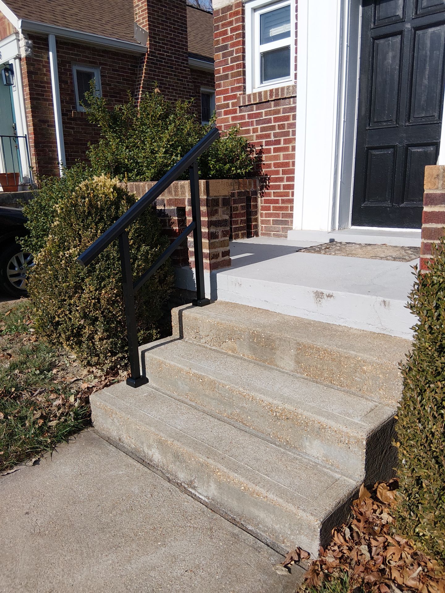 4-Step Aluminum Railing Installation – Concrete Entry Safety Upgrade – Brentwood, MO by Legendary Services Company LLC.