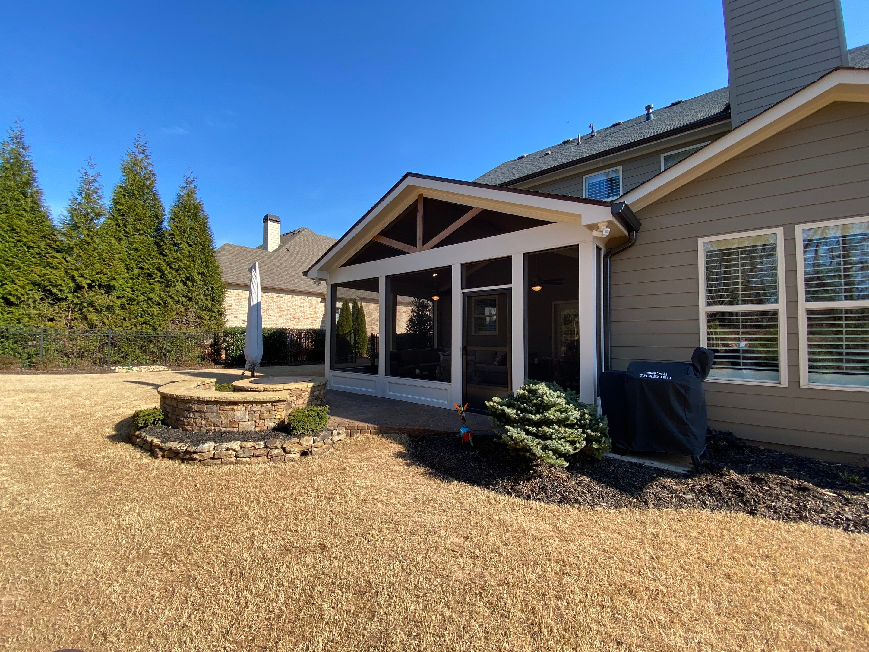 Custom Screened Porch Addition with Vaulted Wood Ceilings in Woodstock by Swift Home Renovations