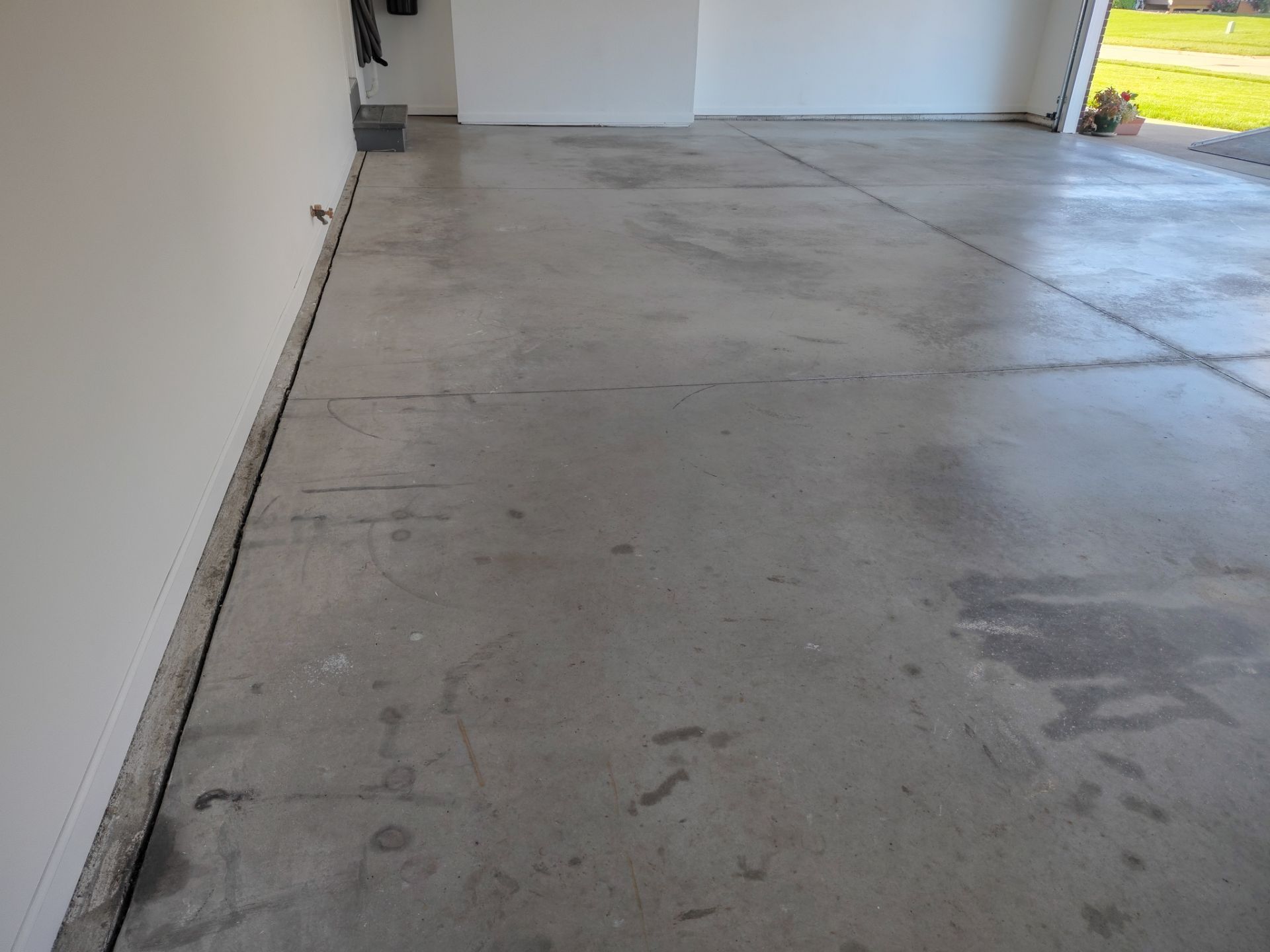 New Johnston Garage Resurfacing by Revival Concrete Coatings, LLC