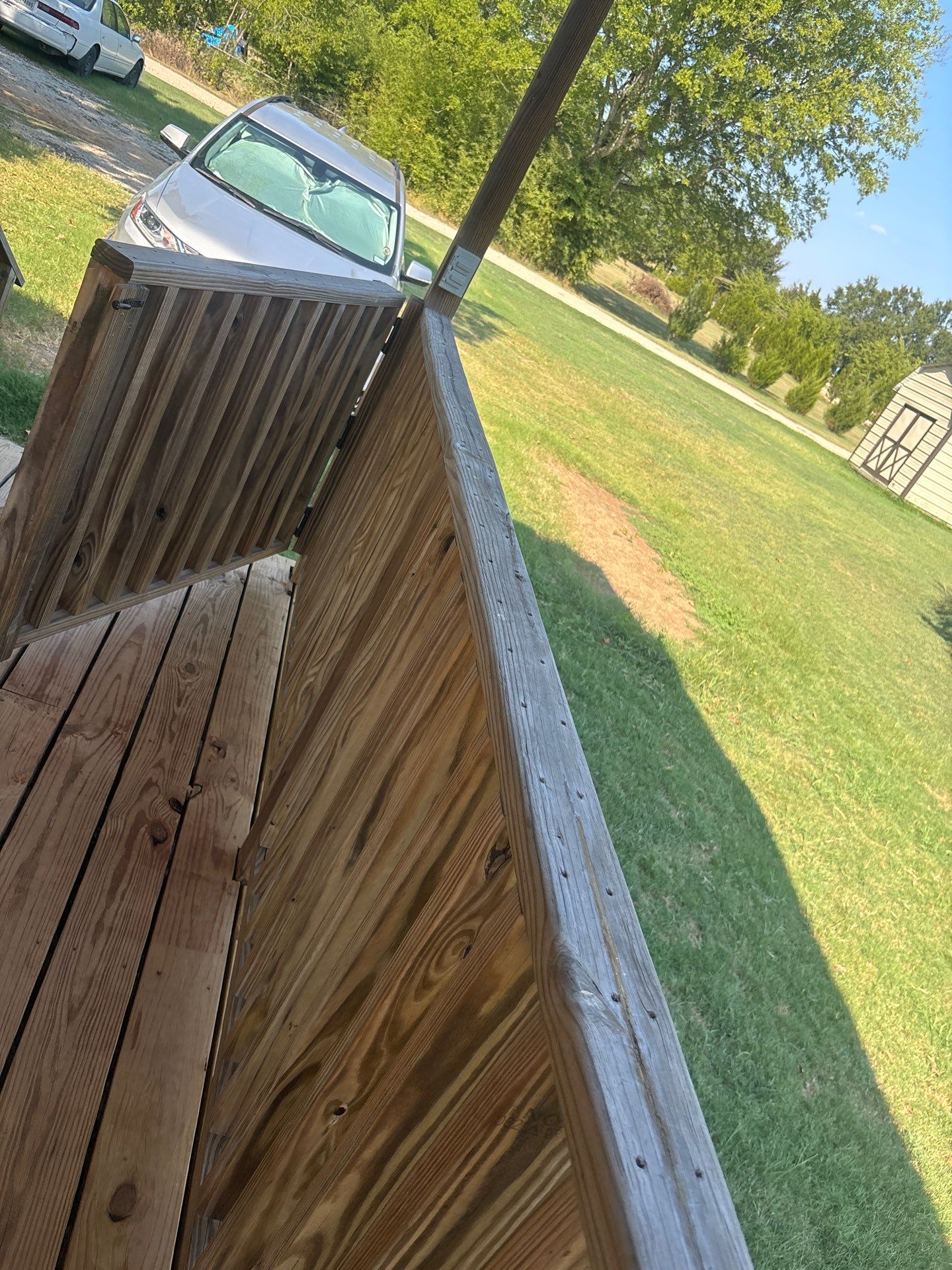 Exterior Painting in Fruitvale, TX | Wood Porch & Home in Deep Navy Blue by Quality Coats Painting