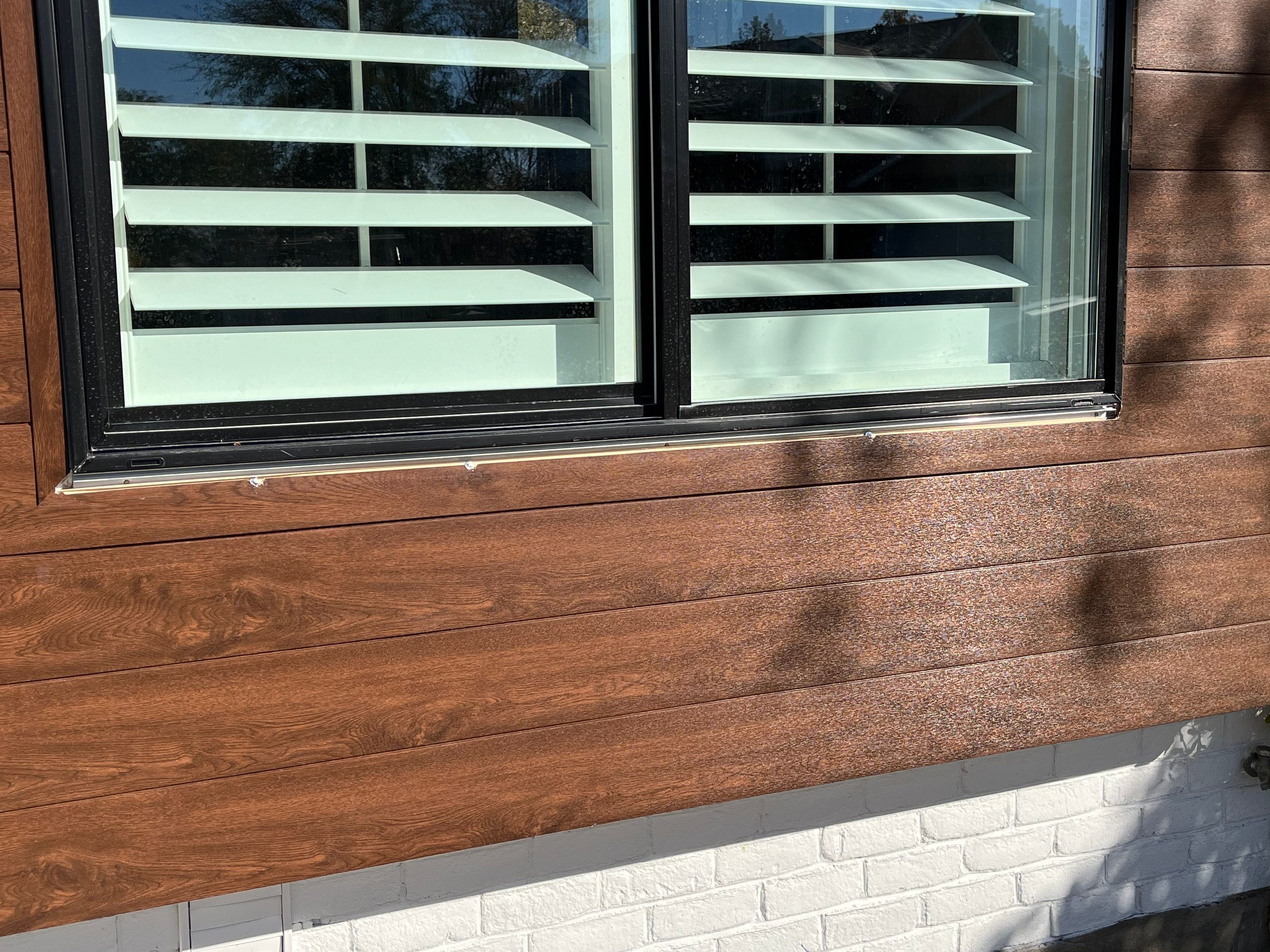 Centerville | High-End Stucco Conversion Accent | Walnut Cedar & Primed B&B by Ideal Siding Utah