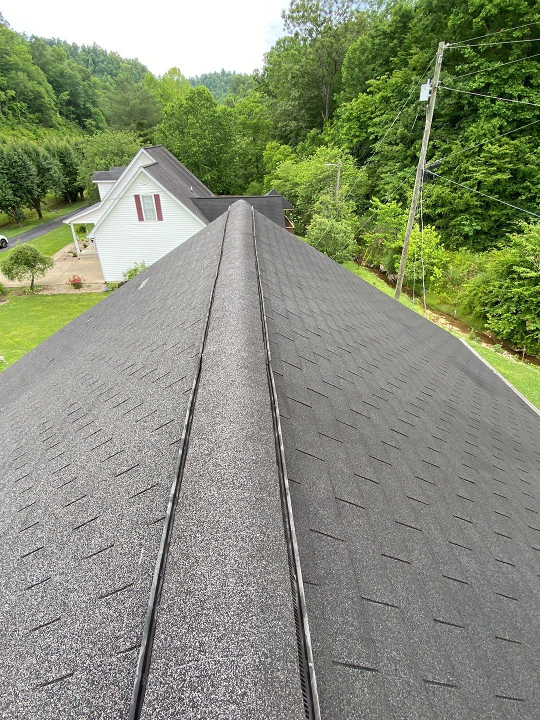 Residential Roofing Installation using Performance Shingles by Mr. Roofer