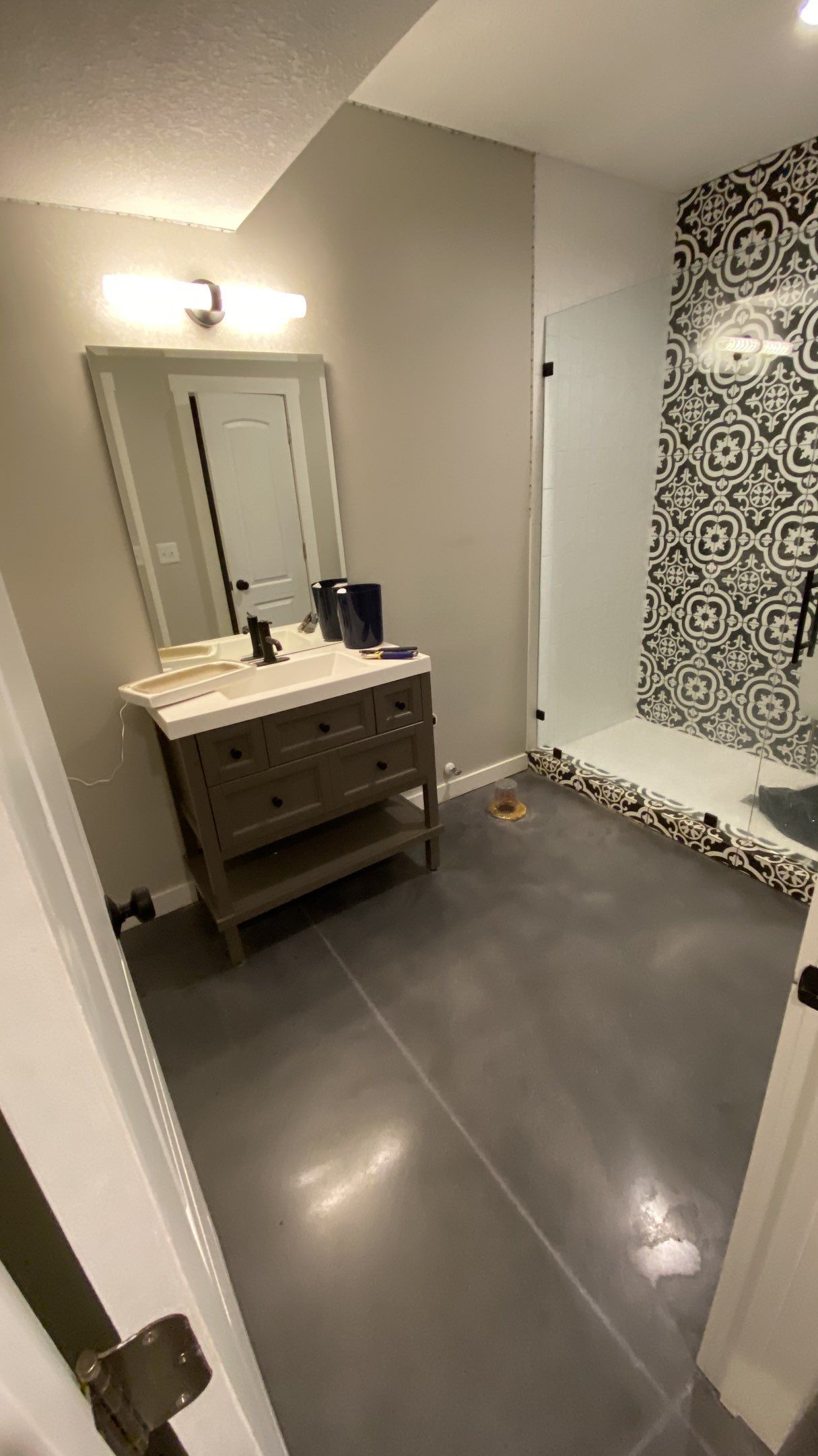 Louisburg, KS -- Basement Polish using Grey Stain by Big Red Decorative Concrete, LLC