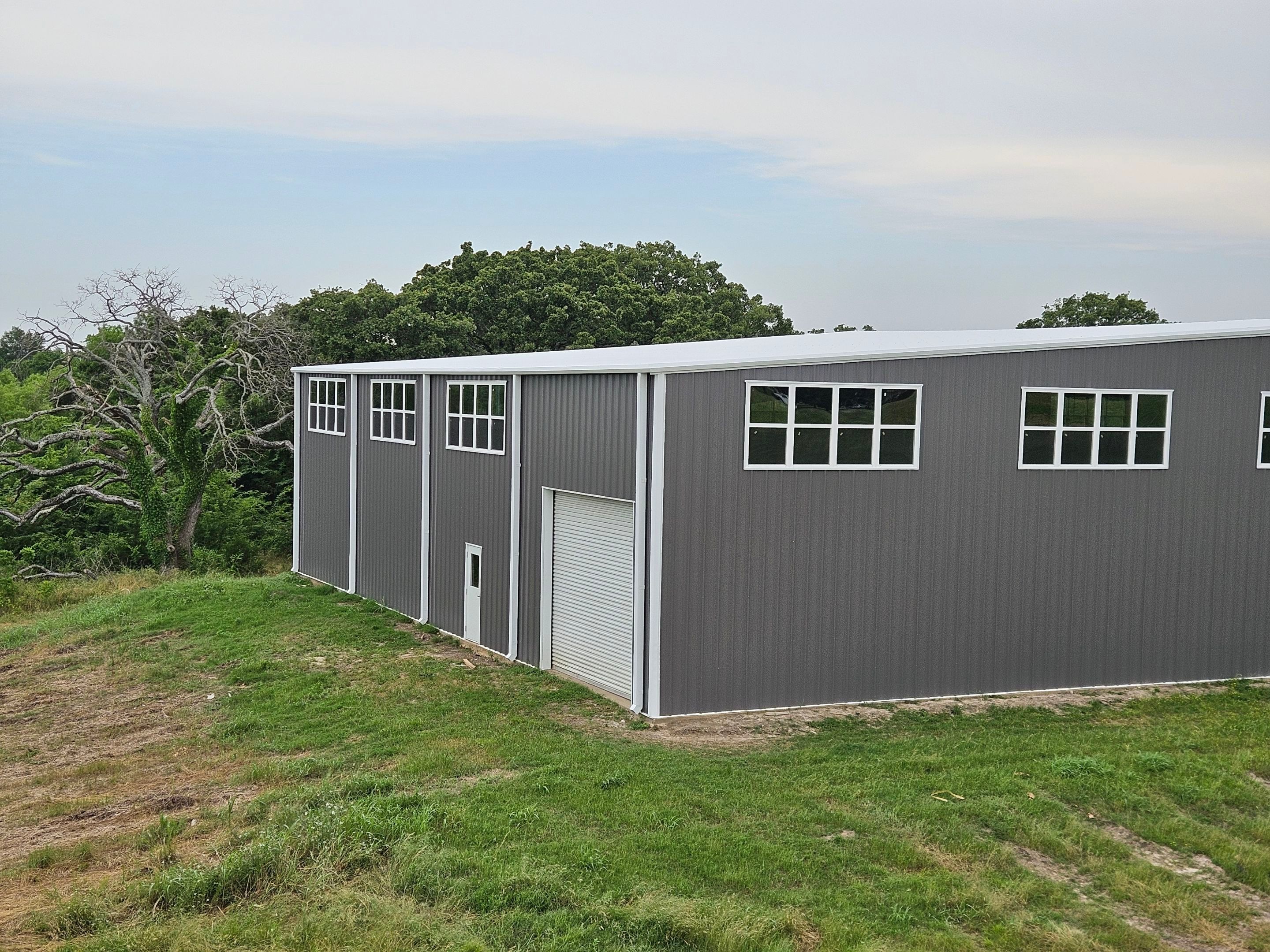 Complete Restoration with Skylight/Window Install - Greenville, TX by Hostetler Roofing