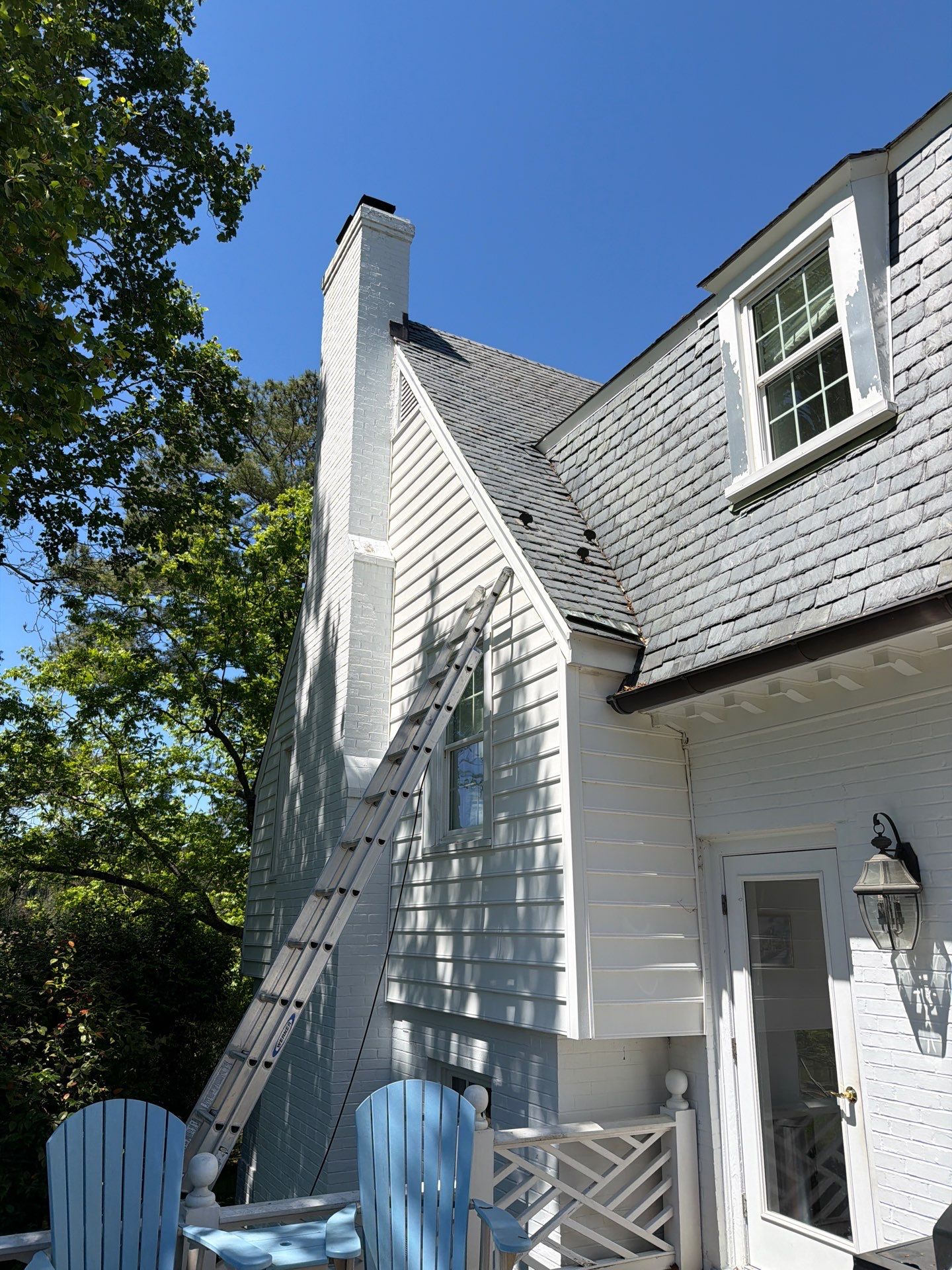Historical Slate Roof Repair and Chimney Flashing Restoration in West Point by Cade Construction