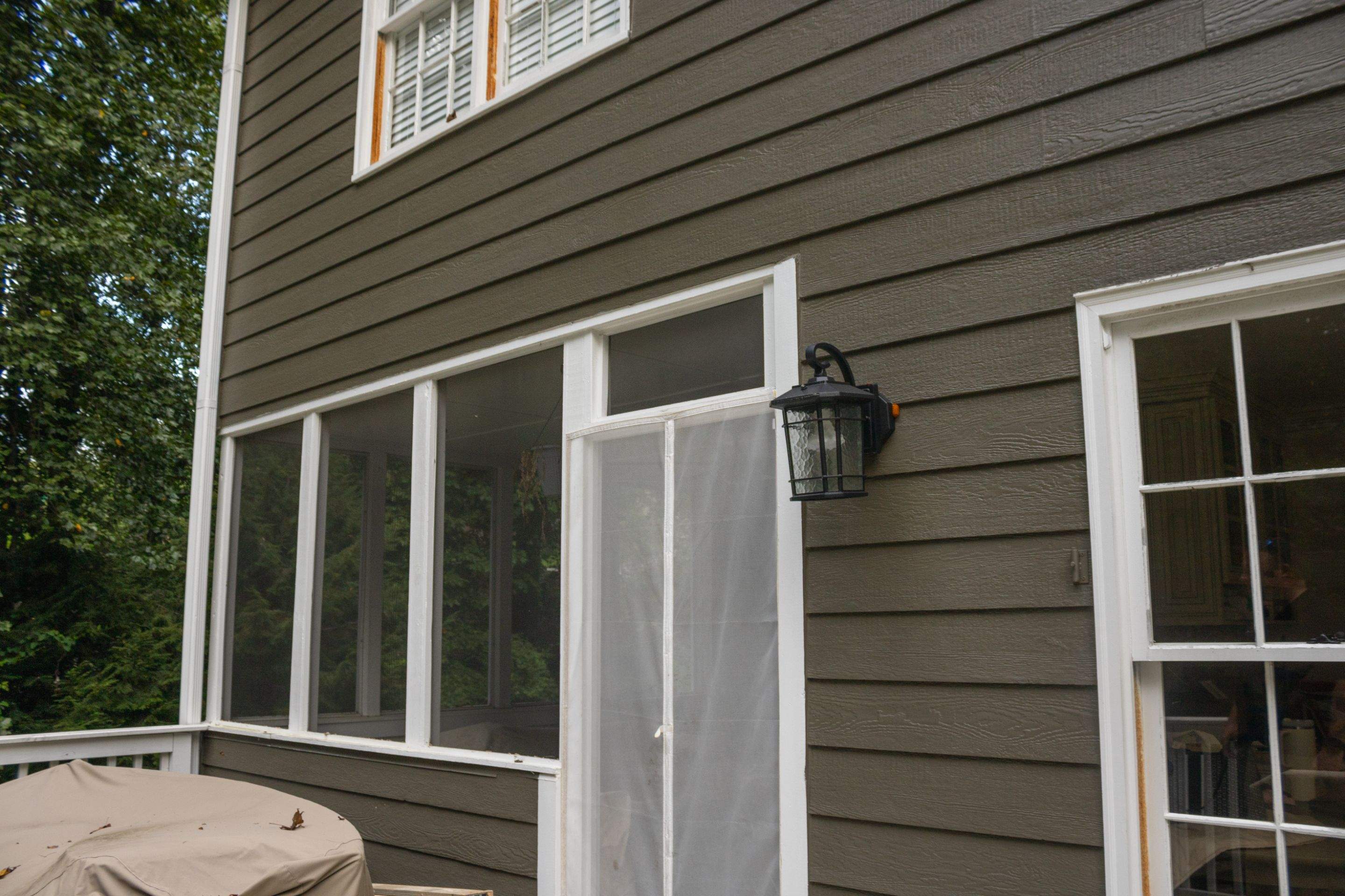 Marietta, GA Full Siding Replacement, 30+ Window Replacements, Screened-In Porch to Sunroom Conversion, Gutter Replacement, and Exterior Painting by Nelson Exteriors