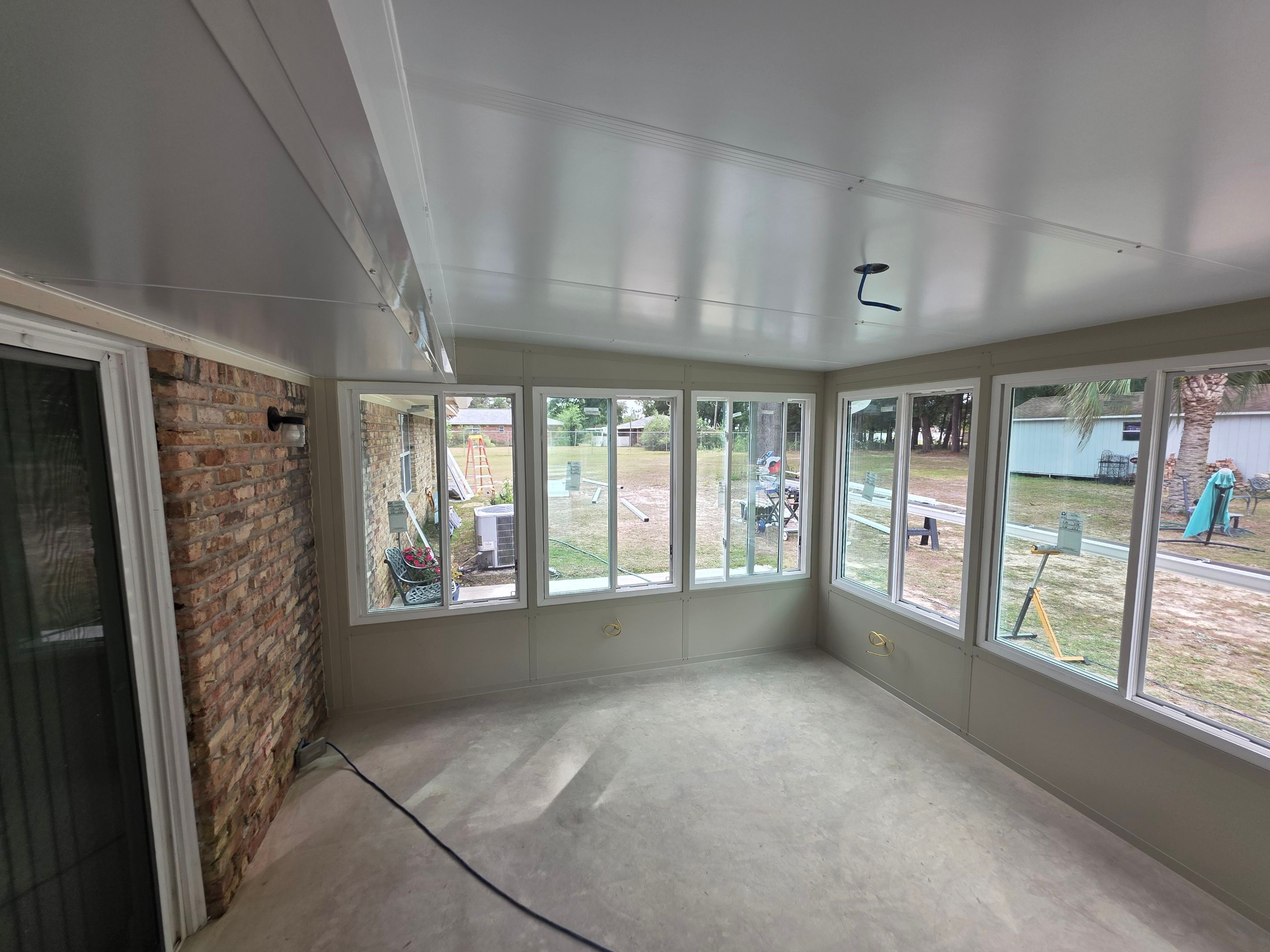 Sunroom Addition and Covered Patio by Titan Sunrooms