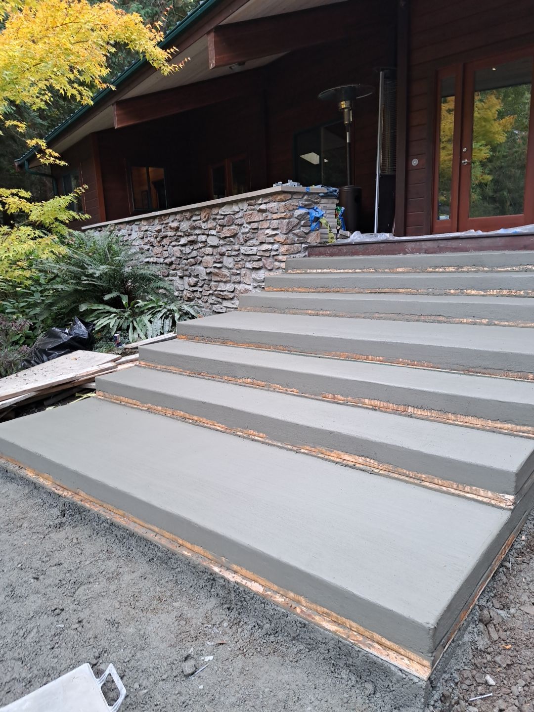 Pia | Custom Concrete Driveway, Walkway & Floating Steps by Jireh Asphalt & Concrete Inc 