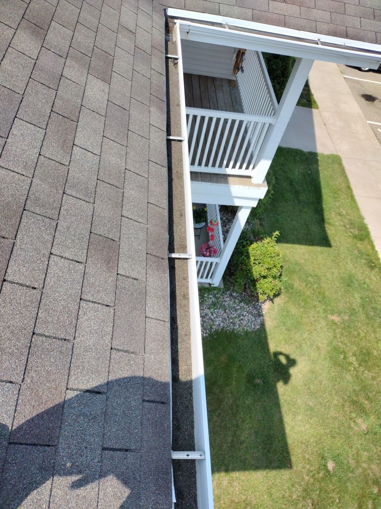HOA gutter cleaning before photo