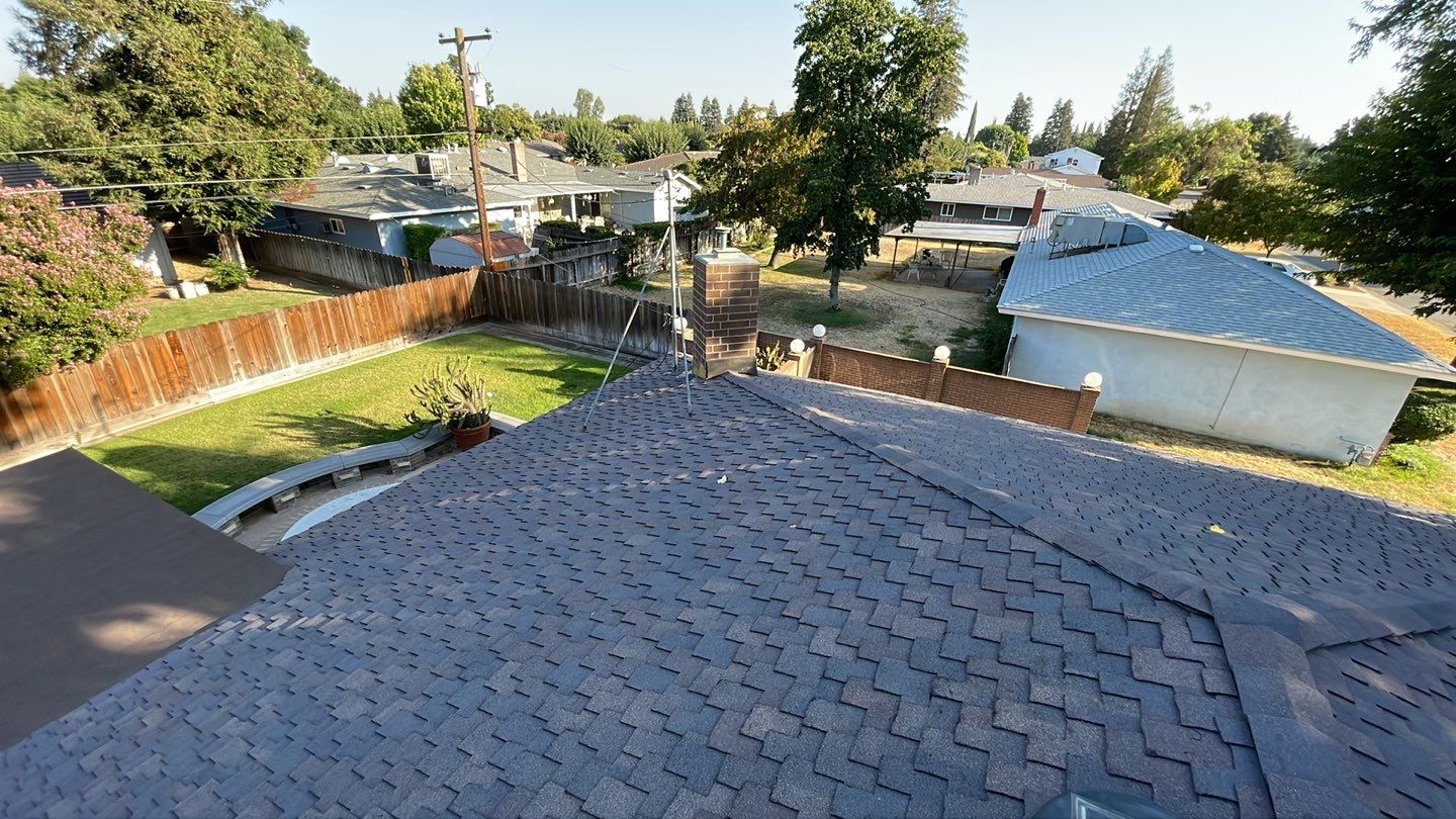 Installation of Certainteed Presidential shingles on residential house by Straight Edge Roofing Inc