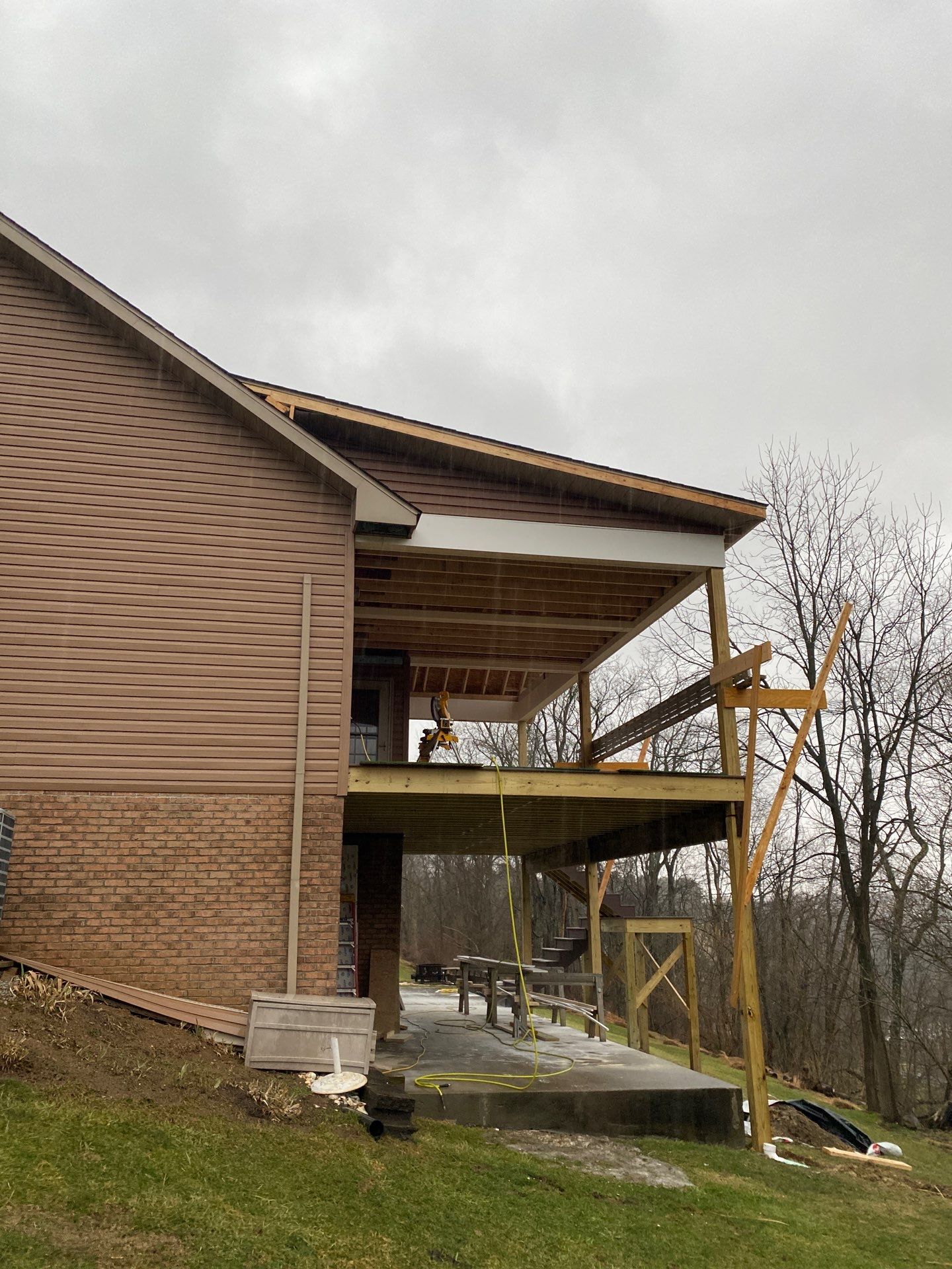 Deck and Roof Build by Cousins Roofing Siding & Decks