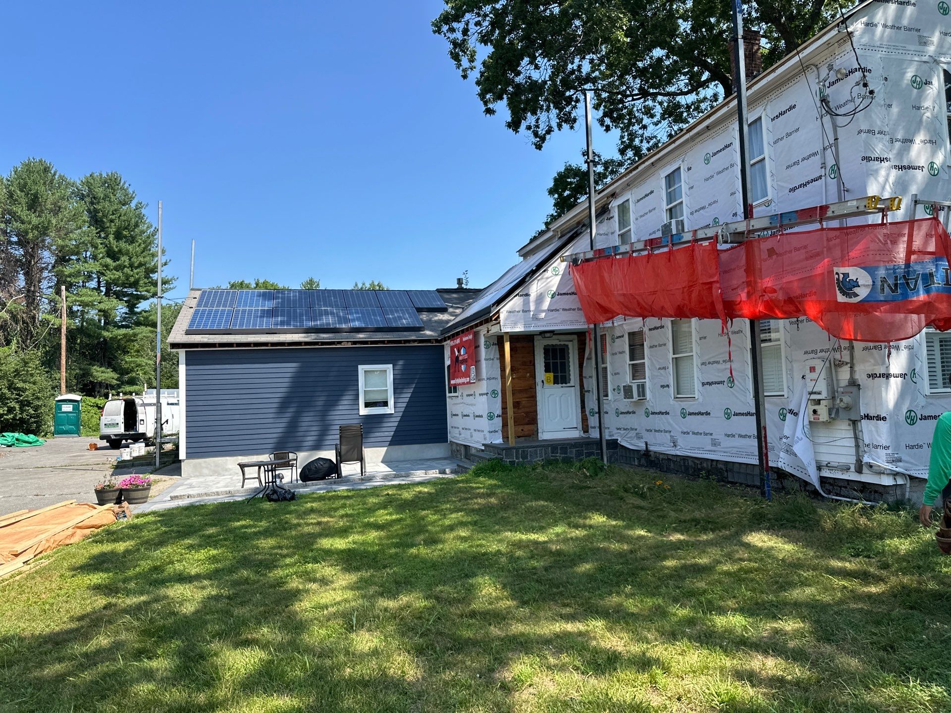 James Hardie Lap Siding Installation in Chelmsford, MA by Mighty Dog Roofing of Greater Middlesex County