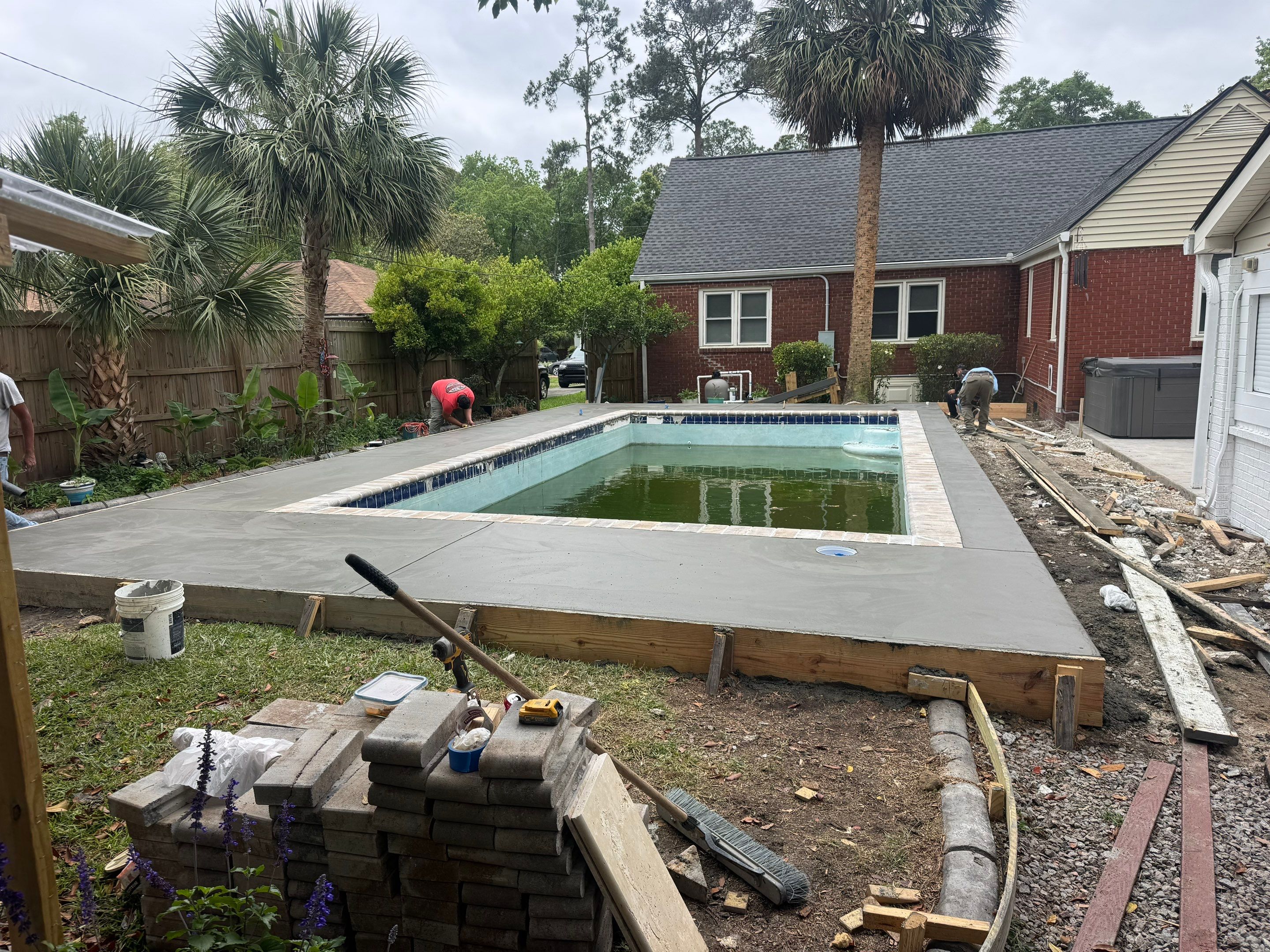 Savannah Pool Deck Replacement with Textured Concrete and Brick Coping by Lowcountry Scapes, LLC