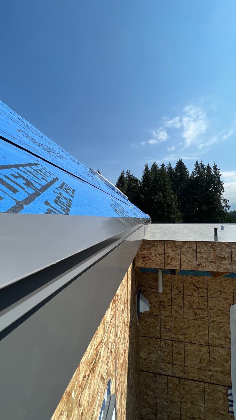 Residential Roofing Installation using multiple products by Top Notch Roofing Inc