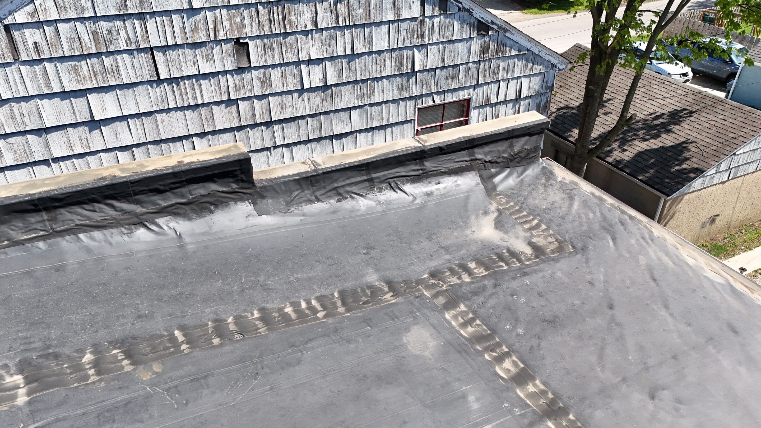 Commercial Flat Roof Replacement by Nitro Roofing and Construction