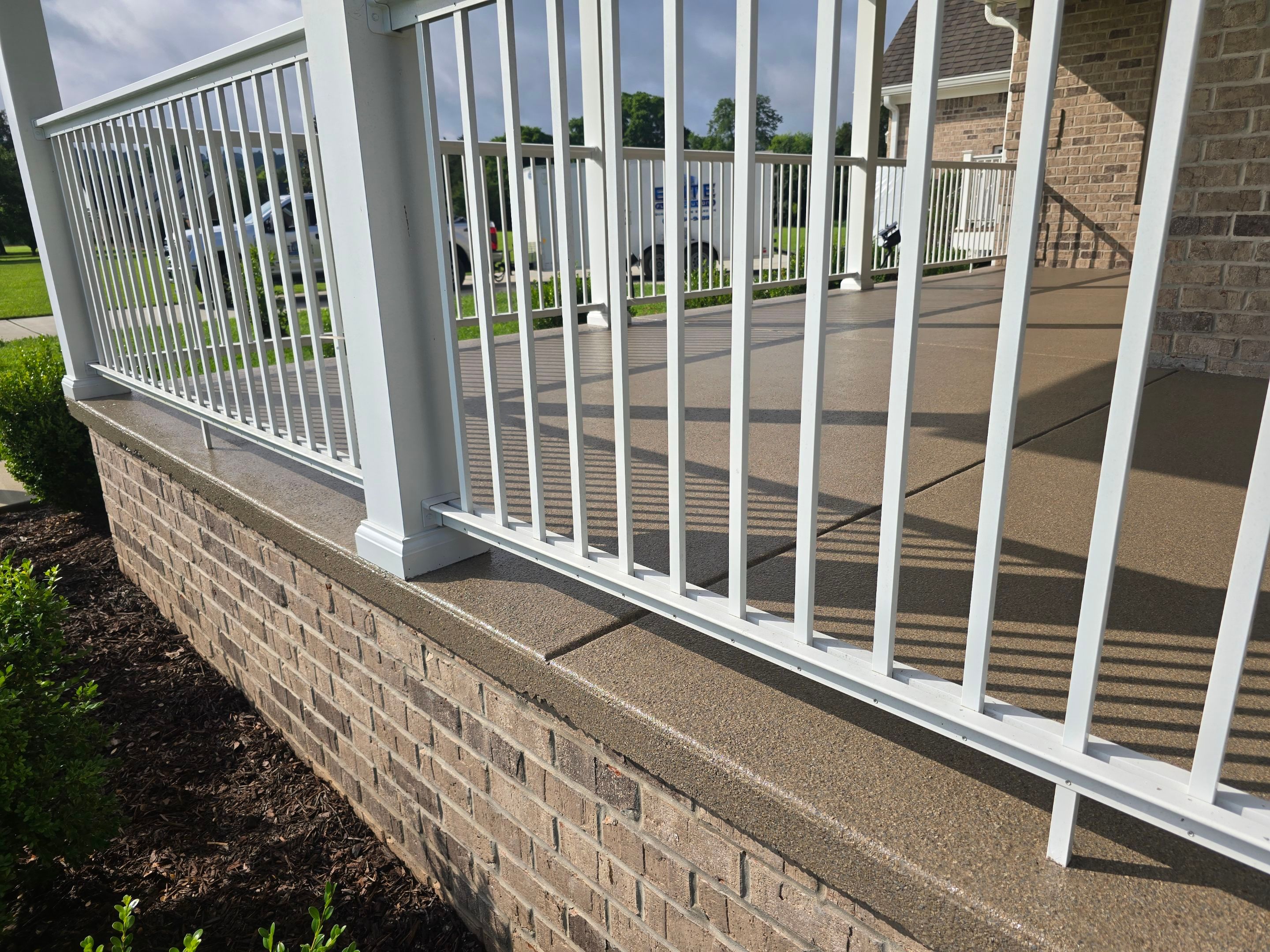 Porch & Garage Using Obsidian by Elite Floor Solutions
