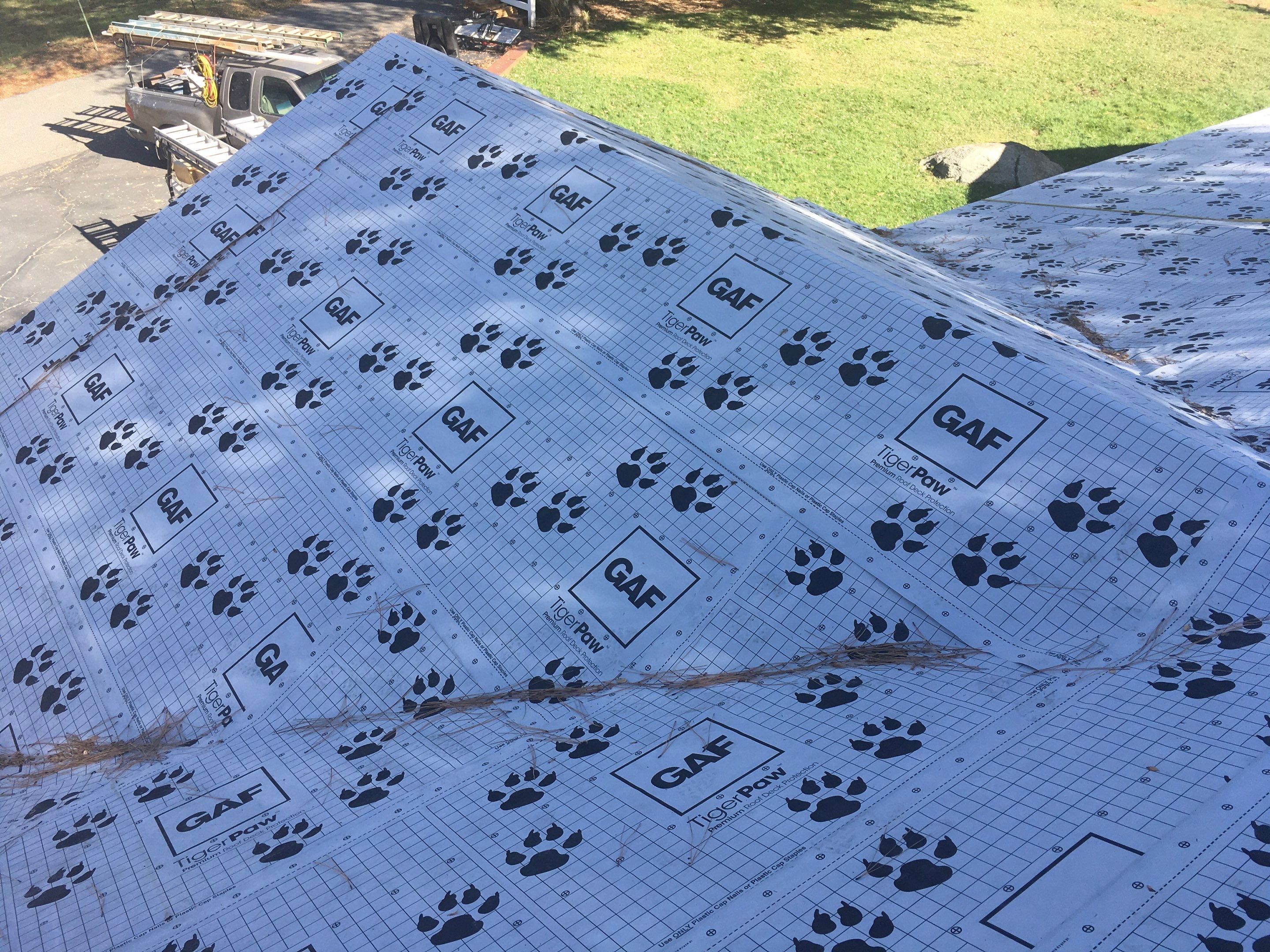 Metal roofing installation using Standing seam metal roofing system by Straight Edge Roofing Inc