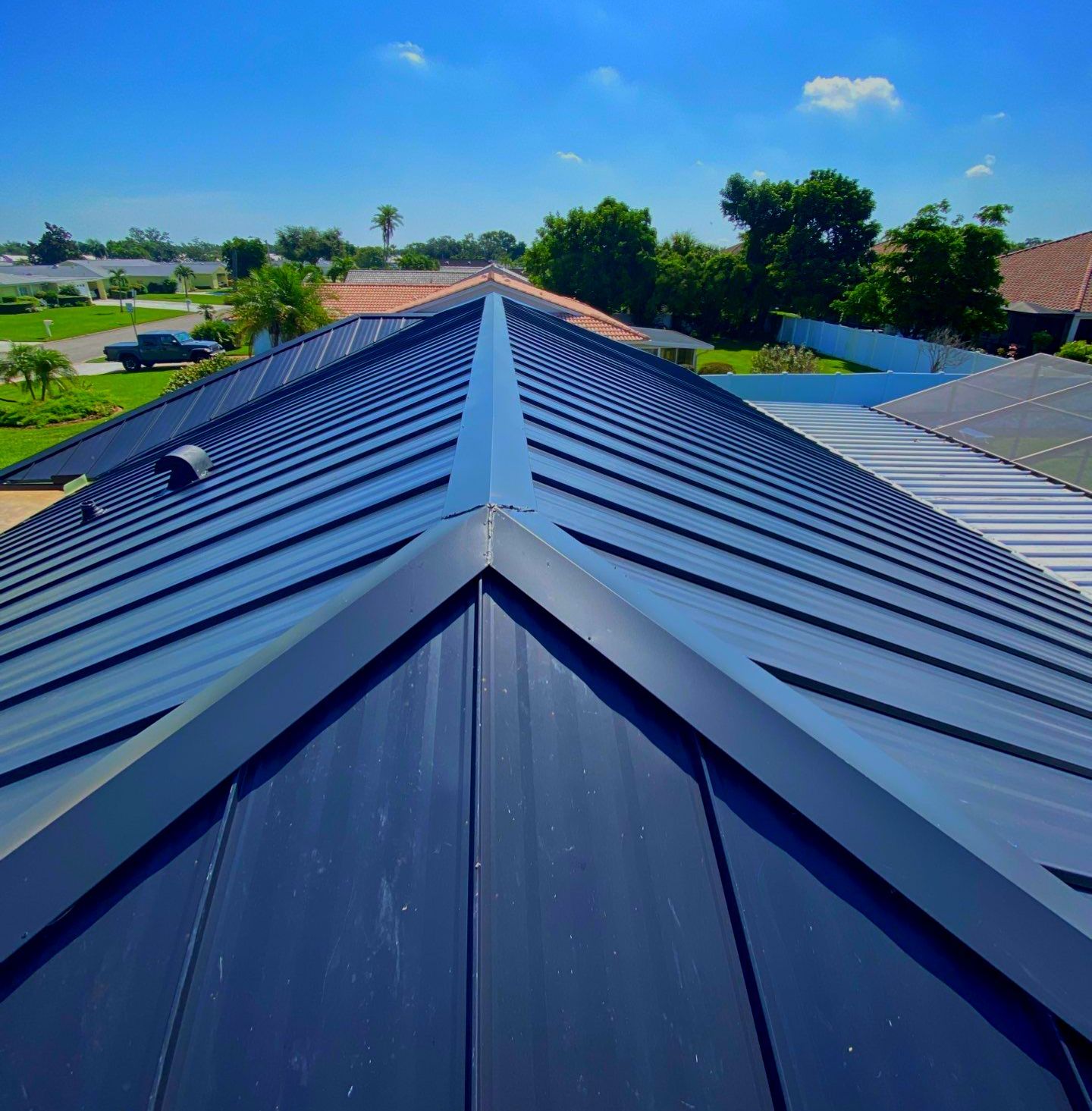 Metal Roofing System by Rooster Roofing, LLC
