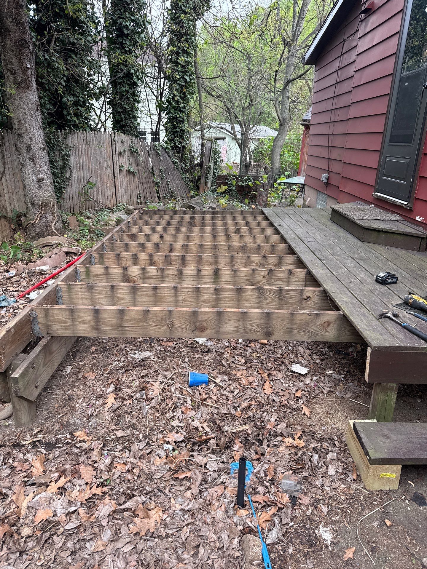 Roof sunspace deck  by Cousins Roofing Siding & Decks