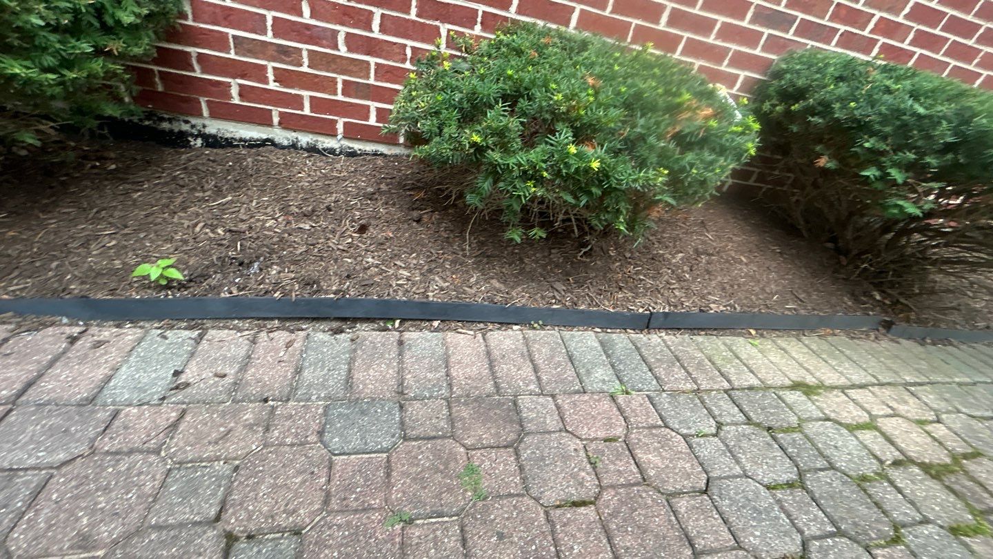 Brick paver repair, clean and seal by Northern Power Washing LLC.