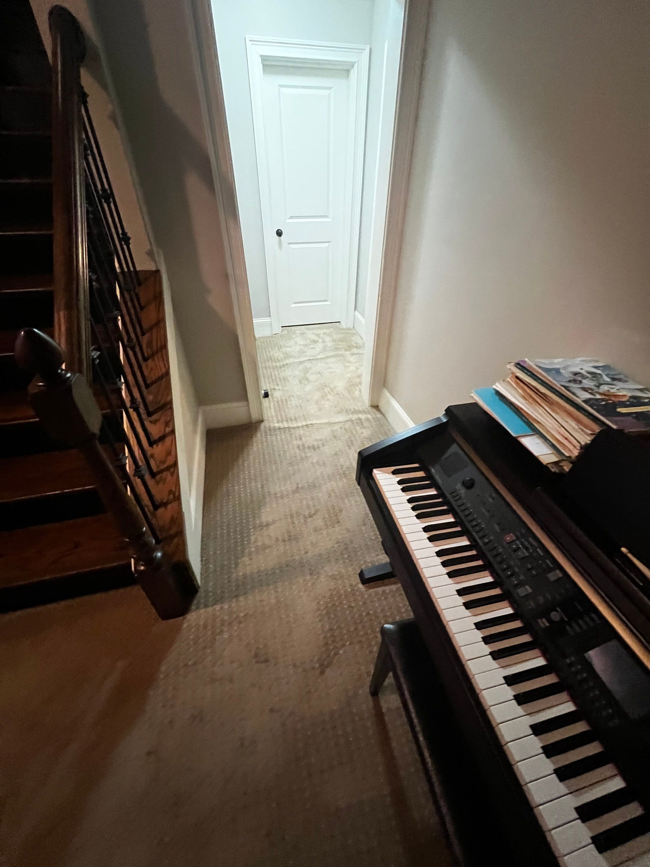 Atlanta Basement Refinishing with Wood Laminate Flooring and Interior Painting by Swift Home Renovations