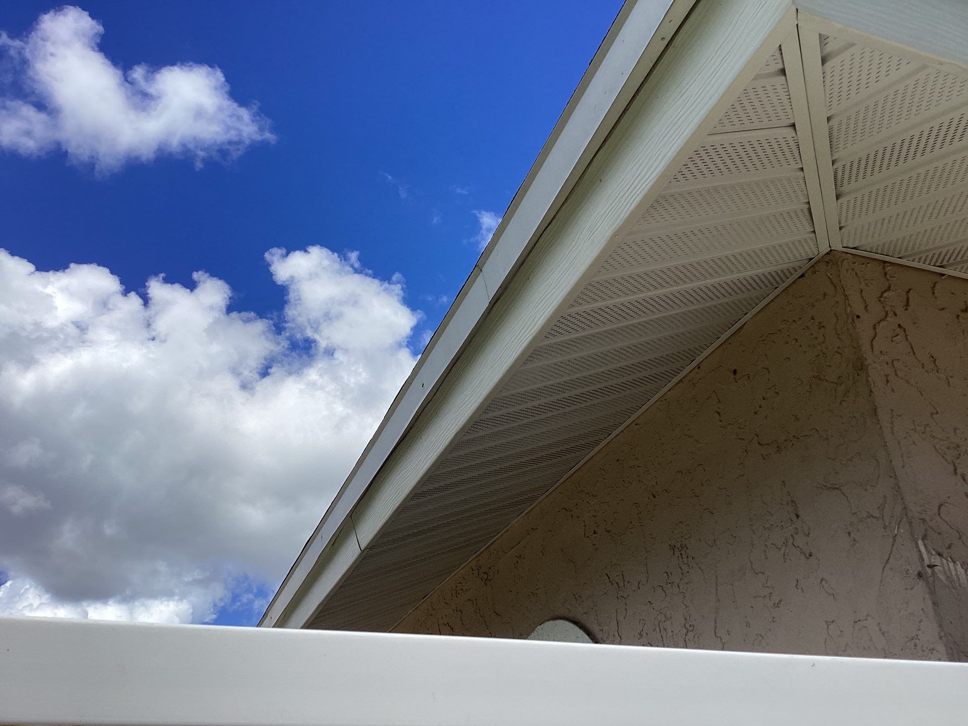 White Seamless Gutters and Splash Guards in Fort Myers FL by Gutter Professor by Gutter Professors