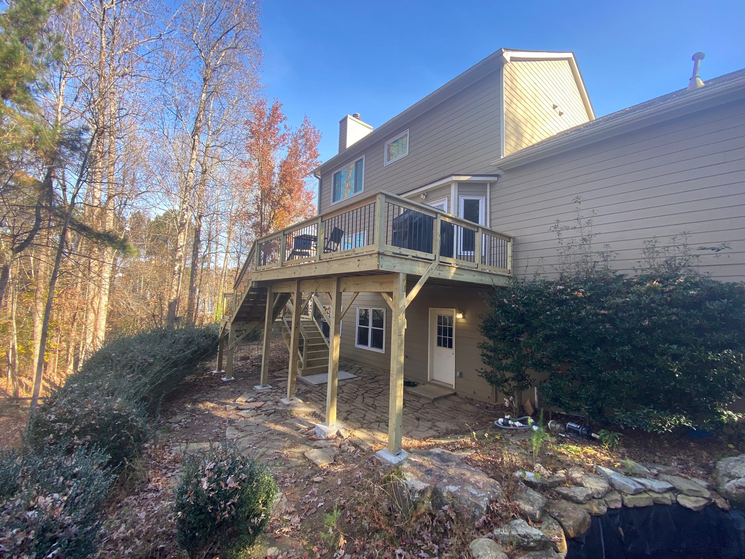 Elevated Wooden Deck and Staircase Construction in Cumming by Swift Home Renovations