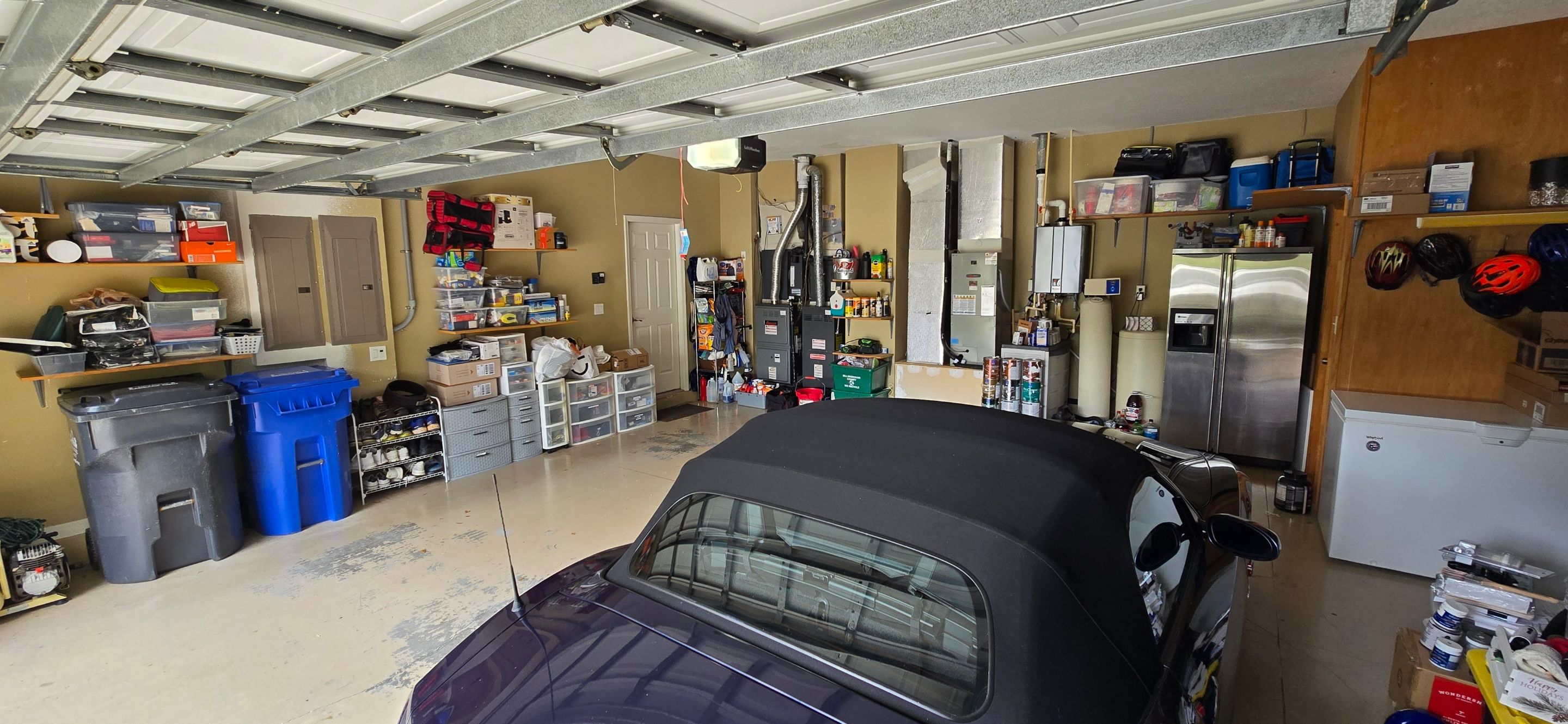 Tampa Garage Floor Coating and Overhead Storage Rack Installation by Square 1 Garage and Closet Solutions
