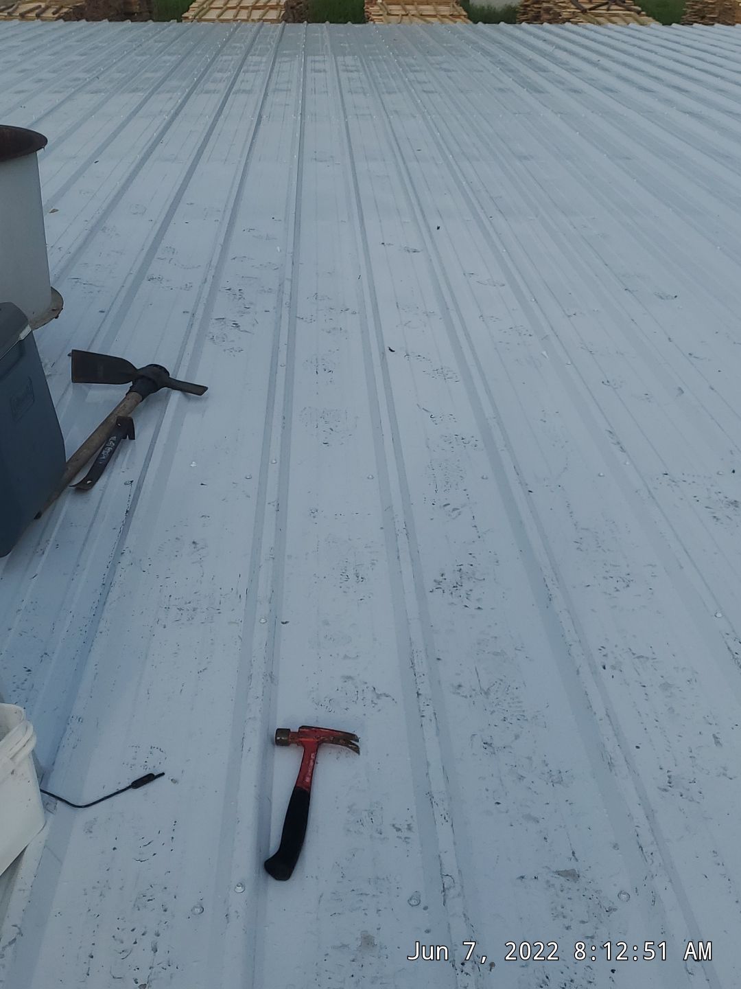 Commercial Roofing Installation using Aluminum Roofing panels by Hostetler Roofing