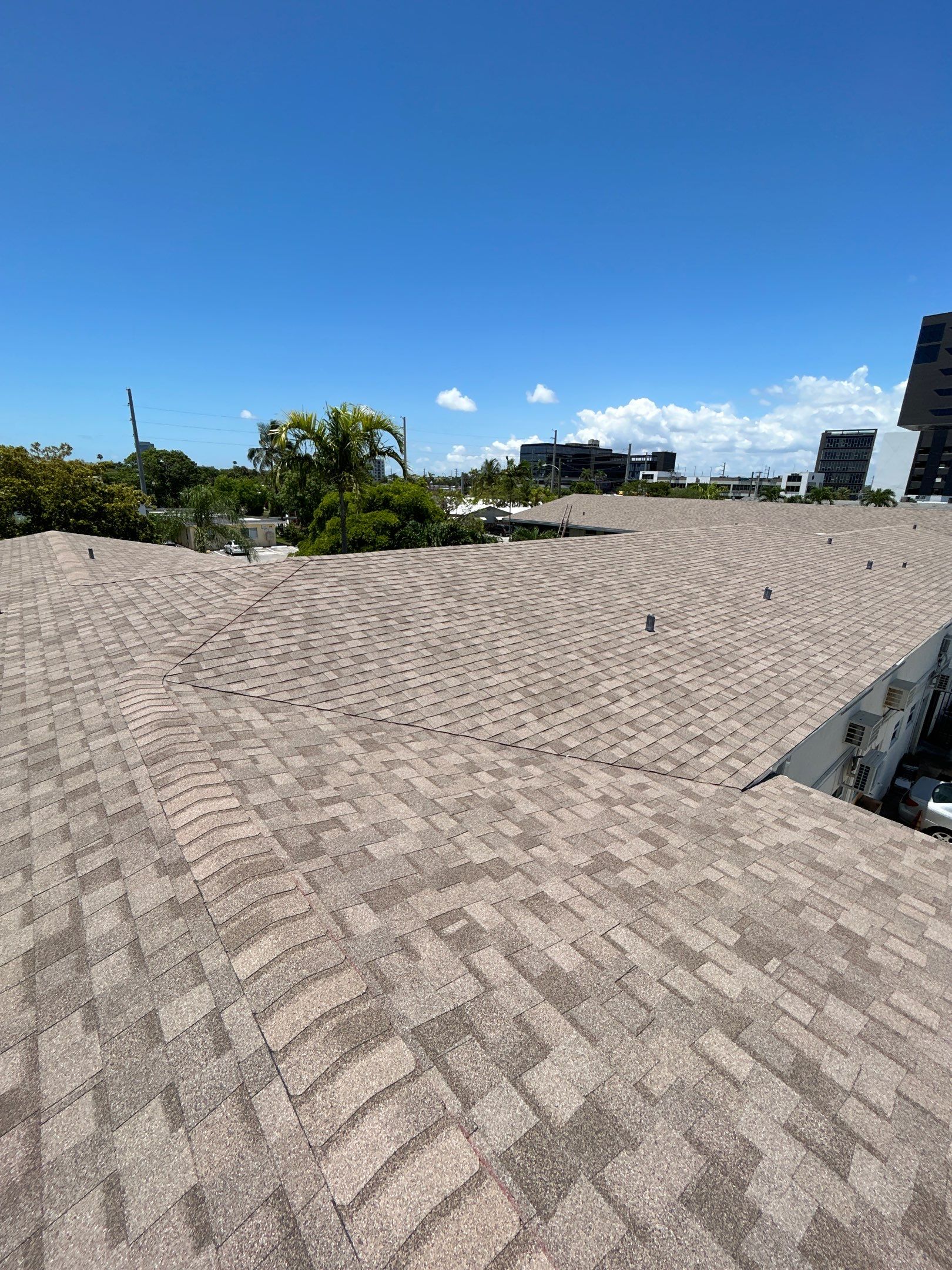 Commercial Roofing Installation using CERTAINTEED LANDMARK AR (SUNRISE CEDAR) by Earl W. Johnston Roofing 