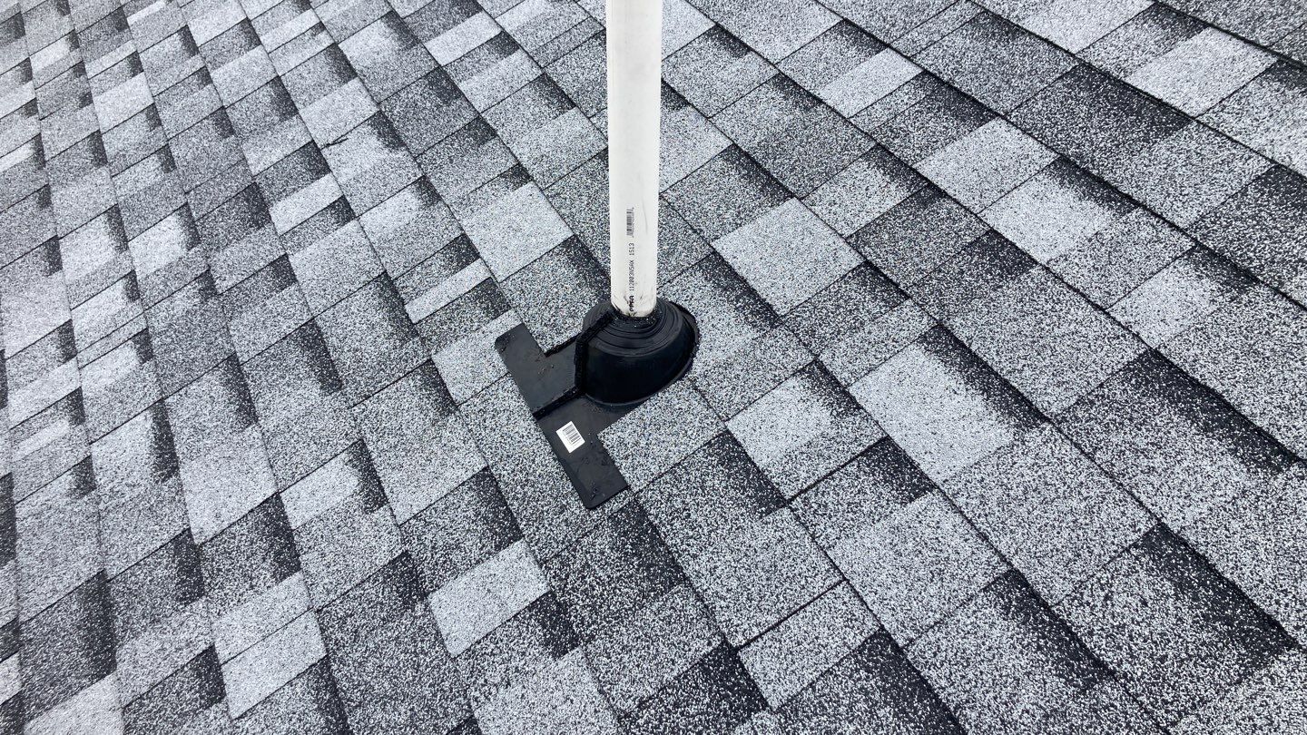 Two story farmhouse style roofing installation using Owens Corning Duration in the color Teak by ID Roofing LLC