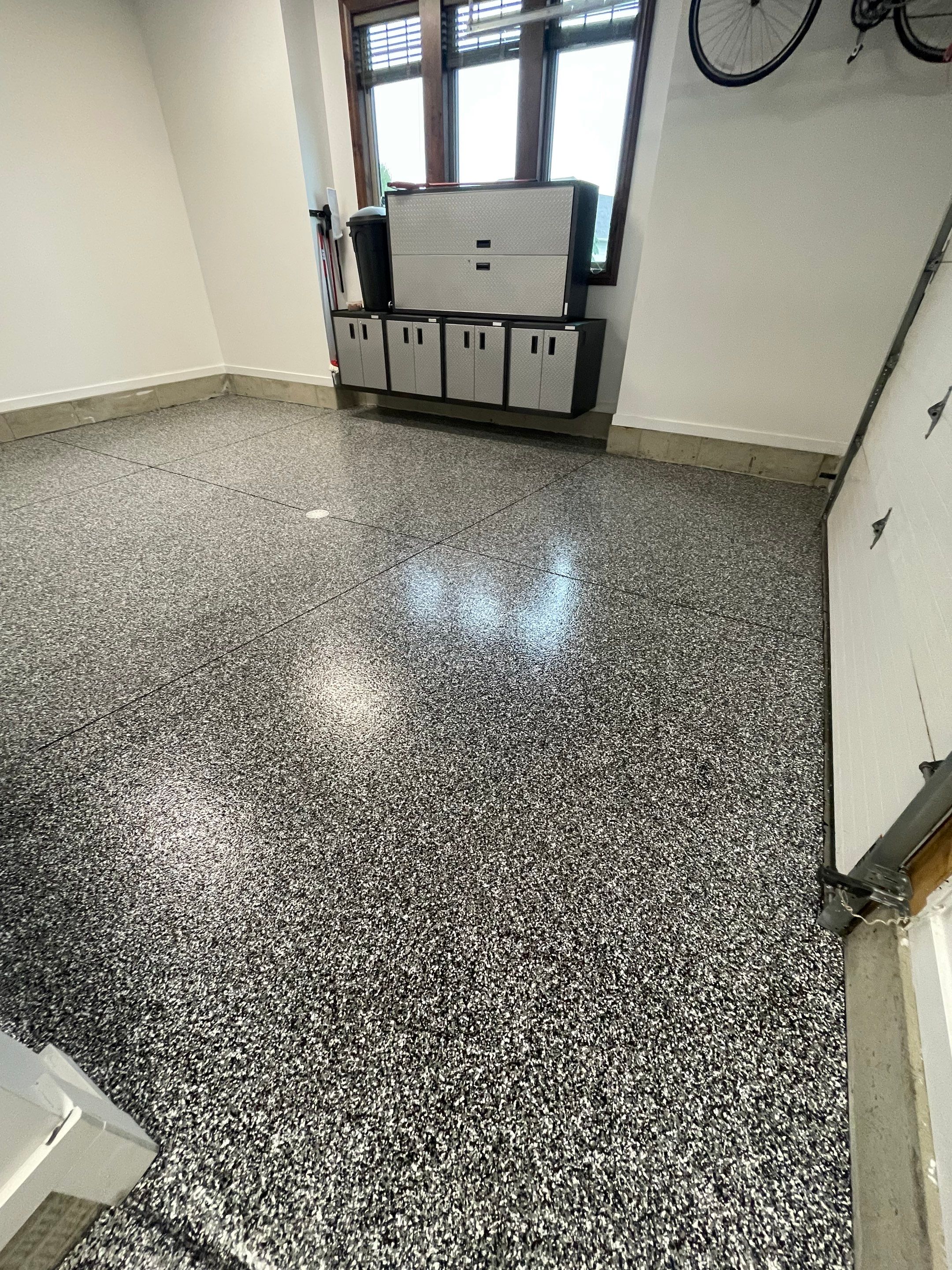 Garage Floor Coating and Domino Flake Finish in Sioux Falls by Select Painting, Coatings & Garage Cabinets