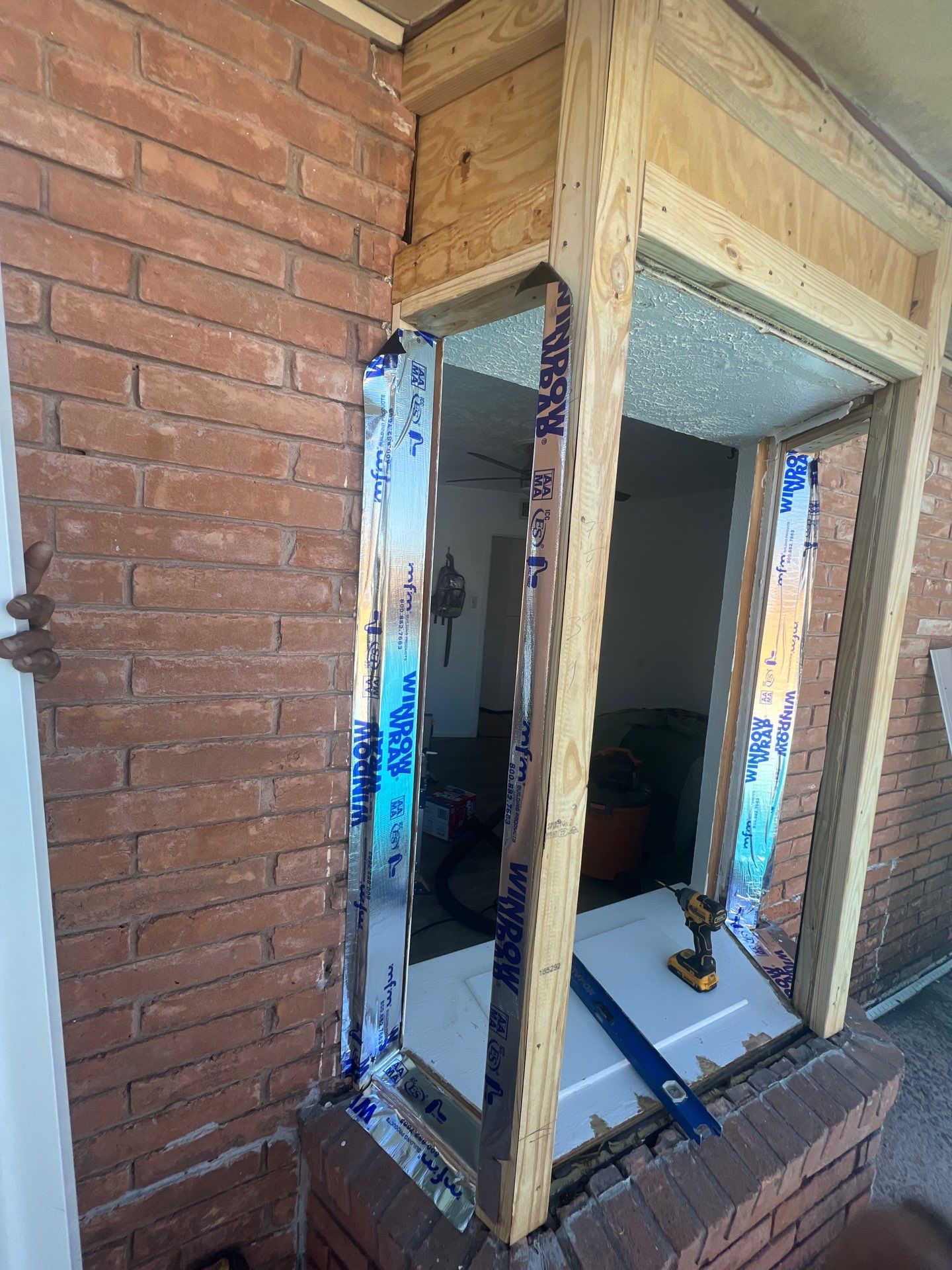 Windows in Brick with a Bay Window by Bayfront Roofing and Construction