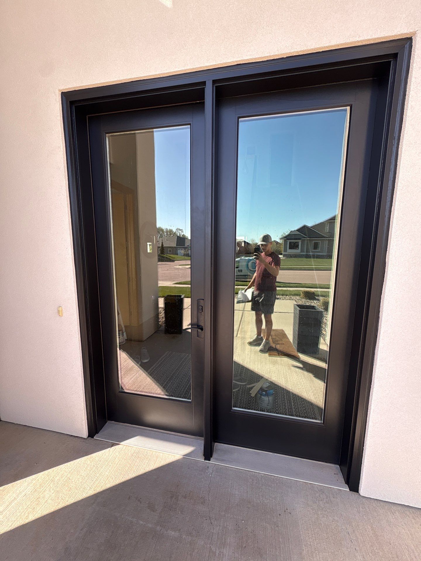 Modern Residential Exterior Painting and Door Refinishing in Sioux Falls by Select Painting, Coatings & Garage Cabinets