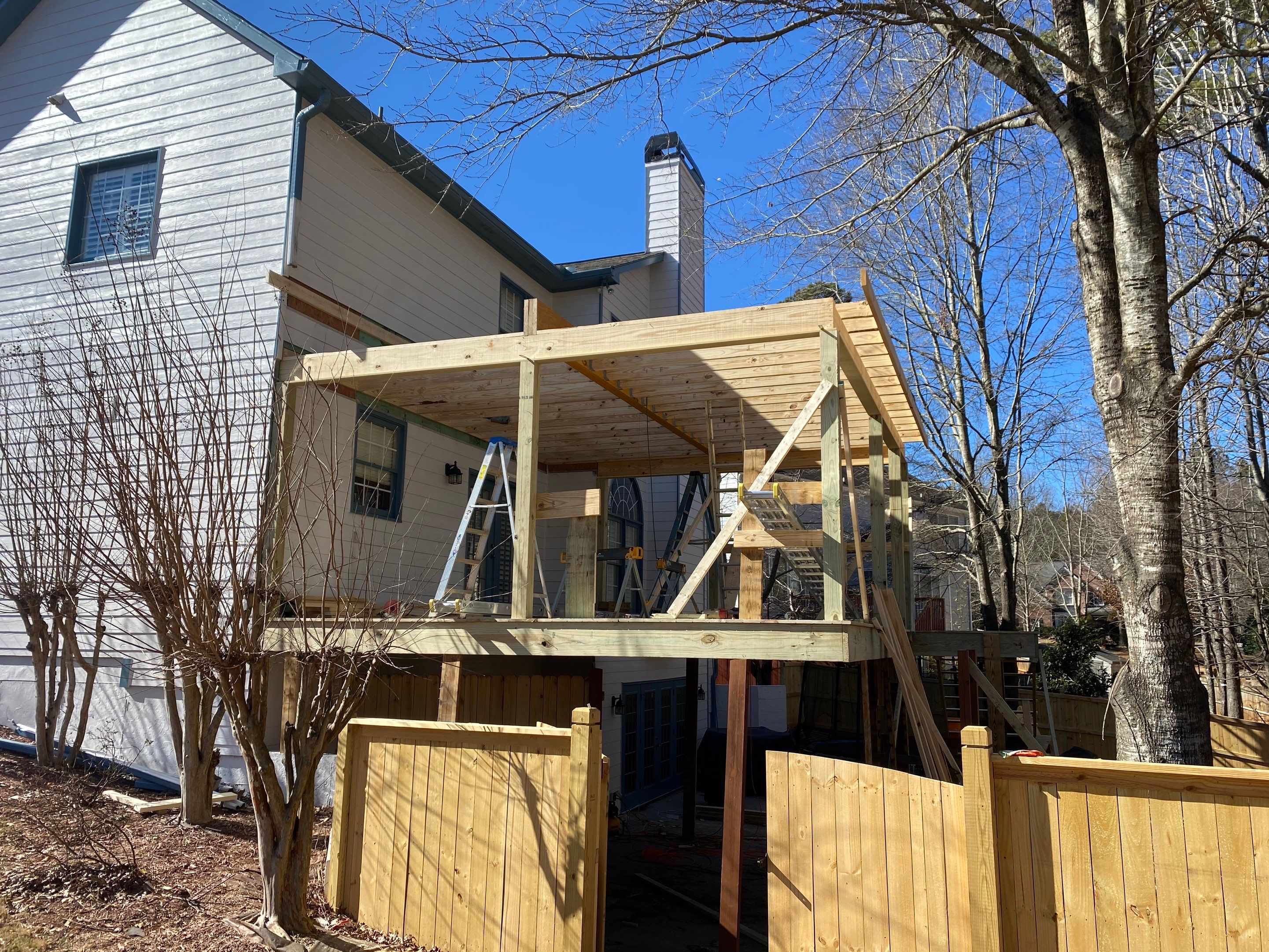 Covered Porch Addition and Custom Privacy Fence Installation in Alpharetta by Swift Home Renovations