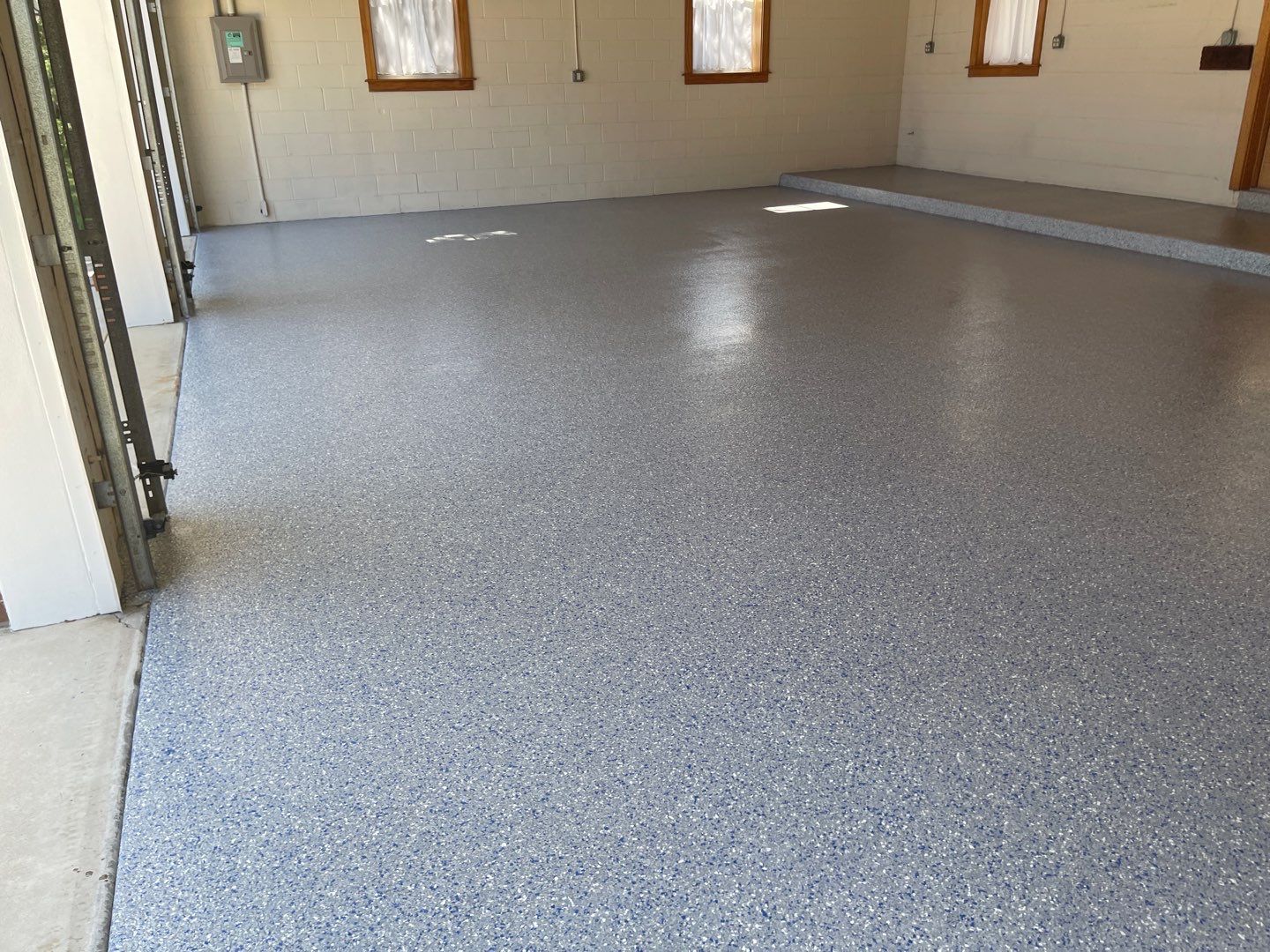 Garages Project in Micanopy, FL in Custom Color by Cross Creek Concrete Coatings