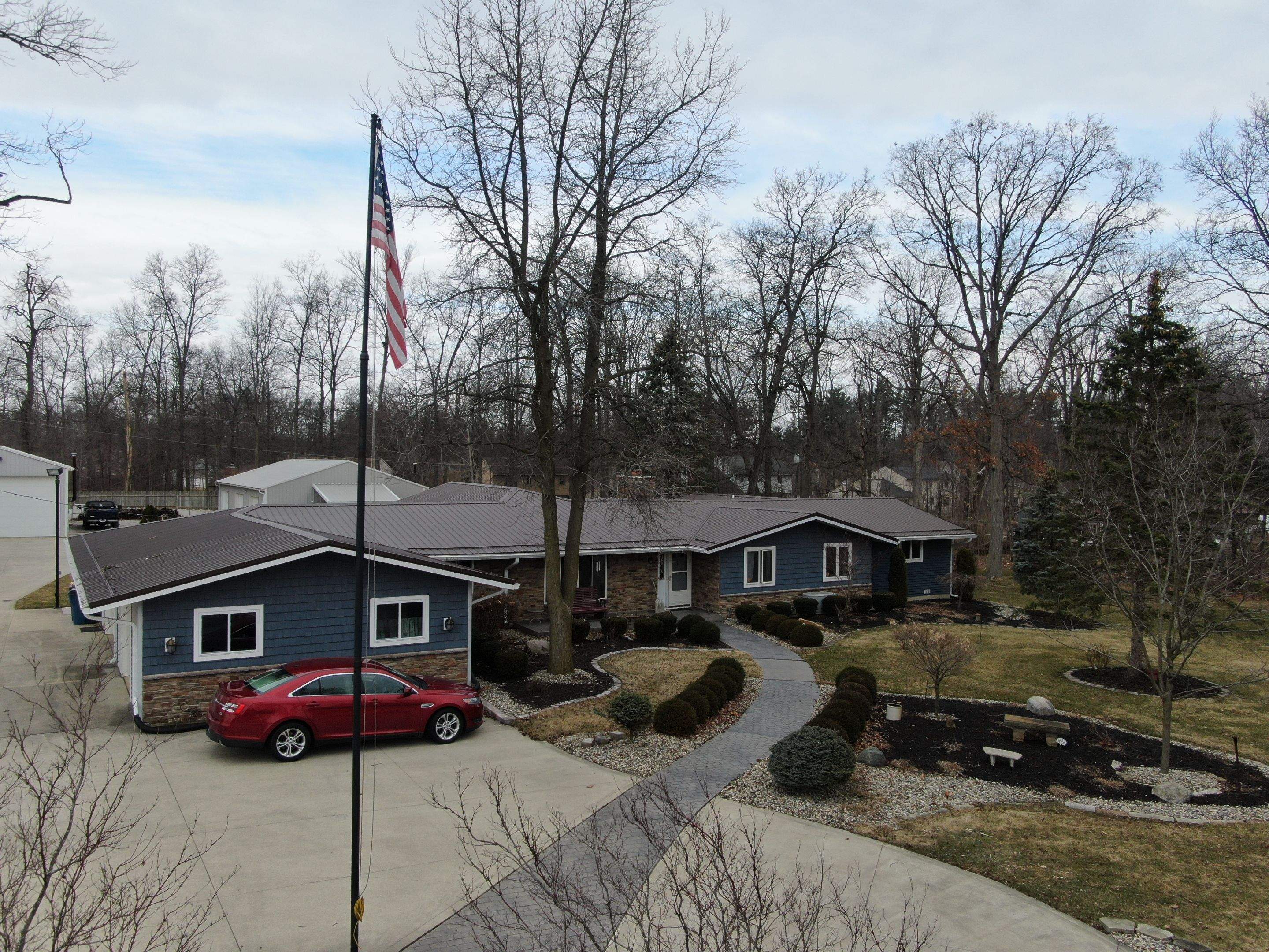 Residential Roofing Installation using Exposed Fastener Metal Roof by 4Ever Metal Roofing