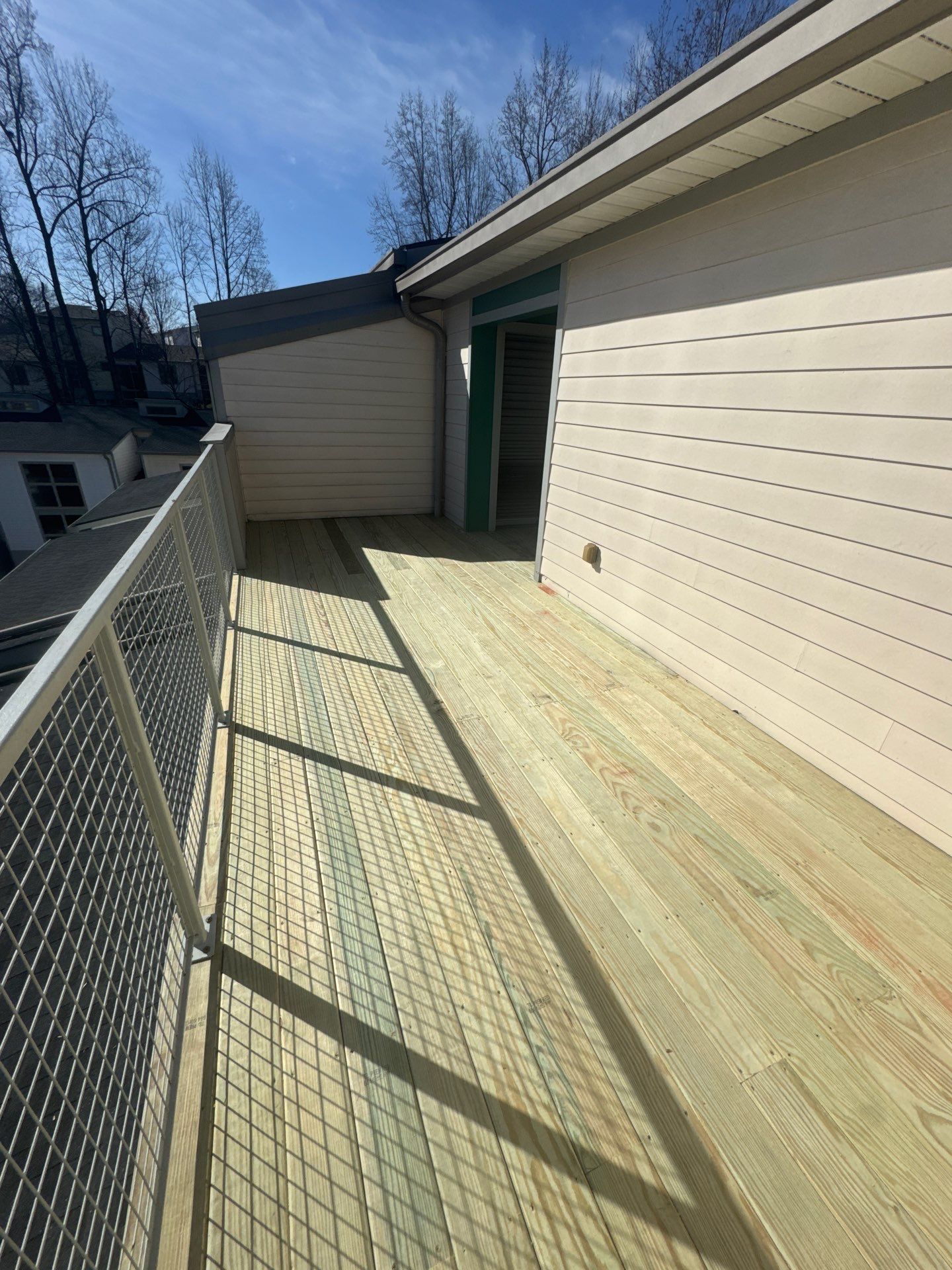 Atlanta Elevated Pressure-Treated Deck Installation With Mesh Railings by Swift Home Renovations 