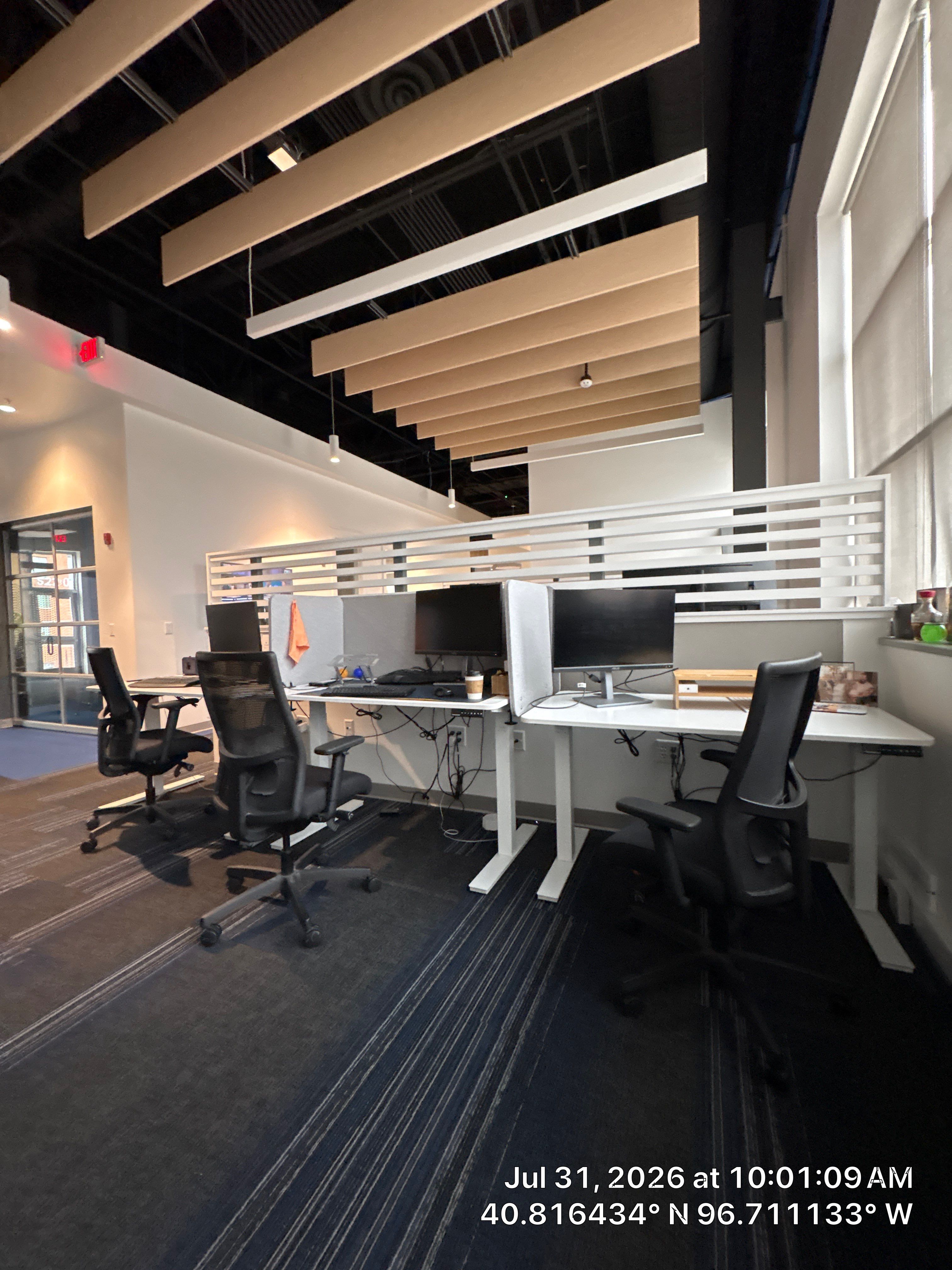 Modern Commercial Office Fit-Out with Acoustic Baffles in Lincoln by CompanyCam Sales Demo