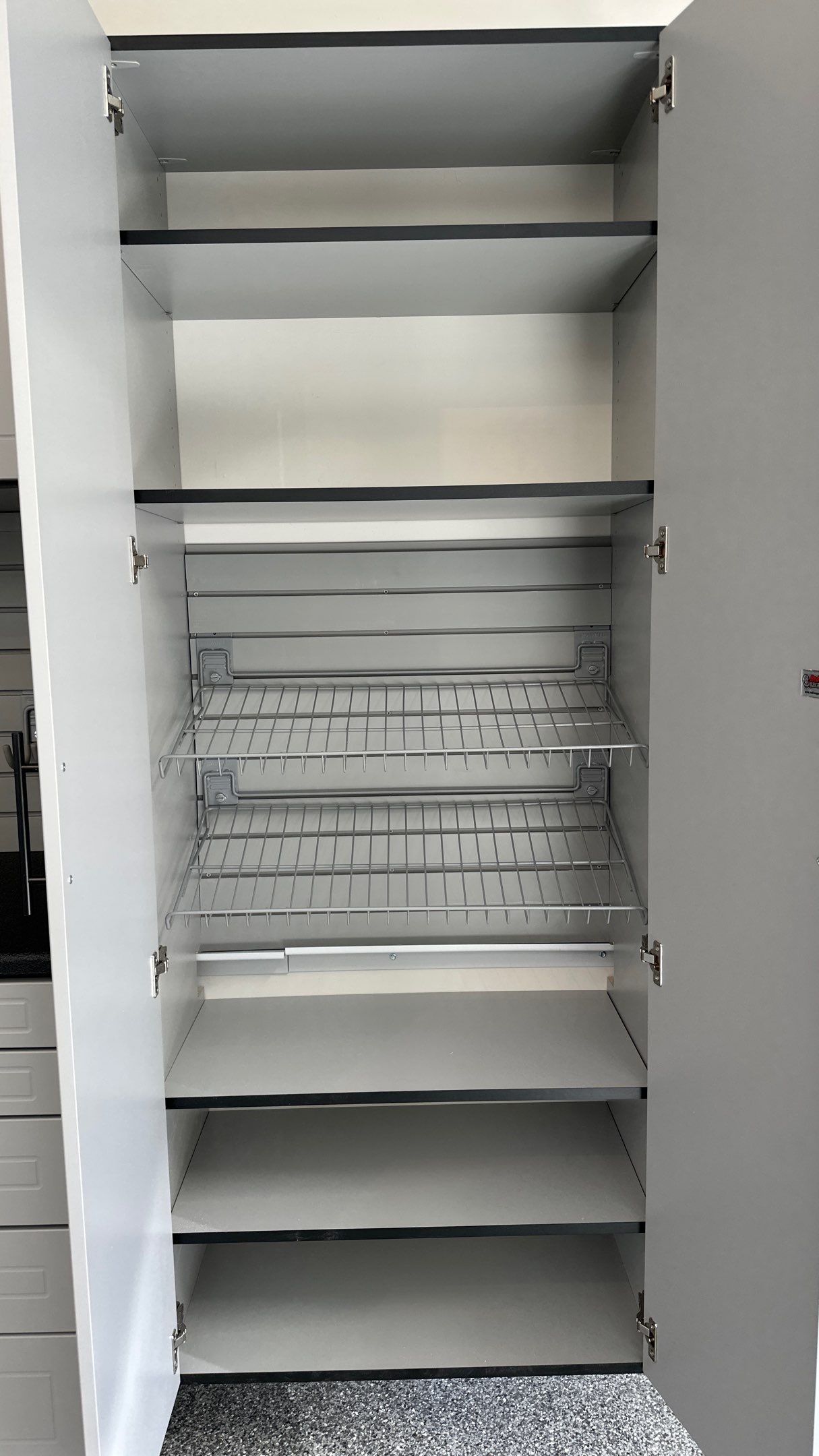 Macy T. transformed her garage with our beautiful cabinets  by Banner Garage