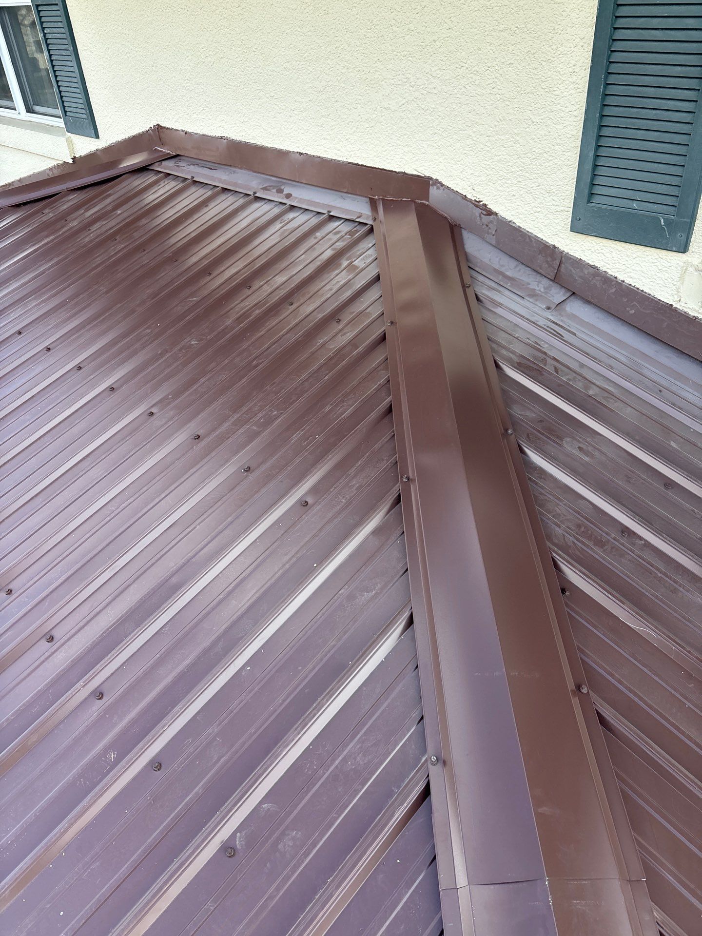 Residential Roofing Installation using Metal by Rainstoppers Roofing