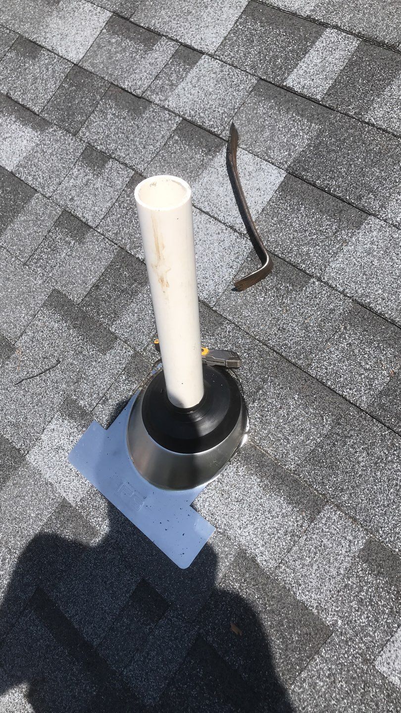 Commercial Roofing Installation using EPDM with white gutters by A Plus Exterior